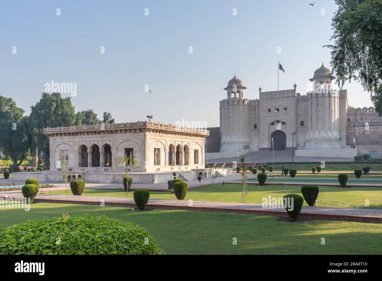 View with garden and marble pavilion of Alamgiri gate built by mughal emperor Aurangzeb, Lahore fort, UNESCO World Heritage site, Punjab, Pakistan Stock Photo