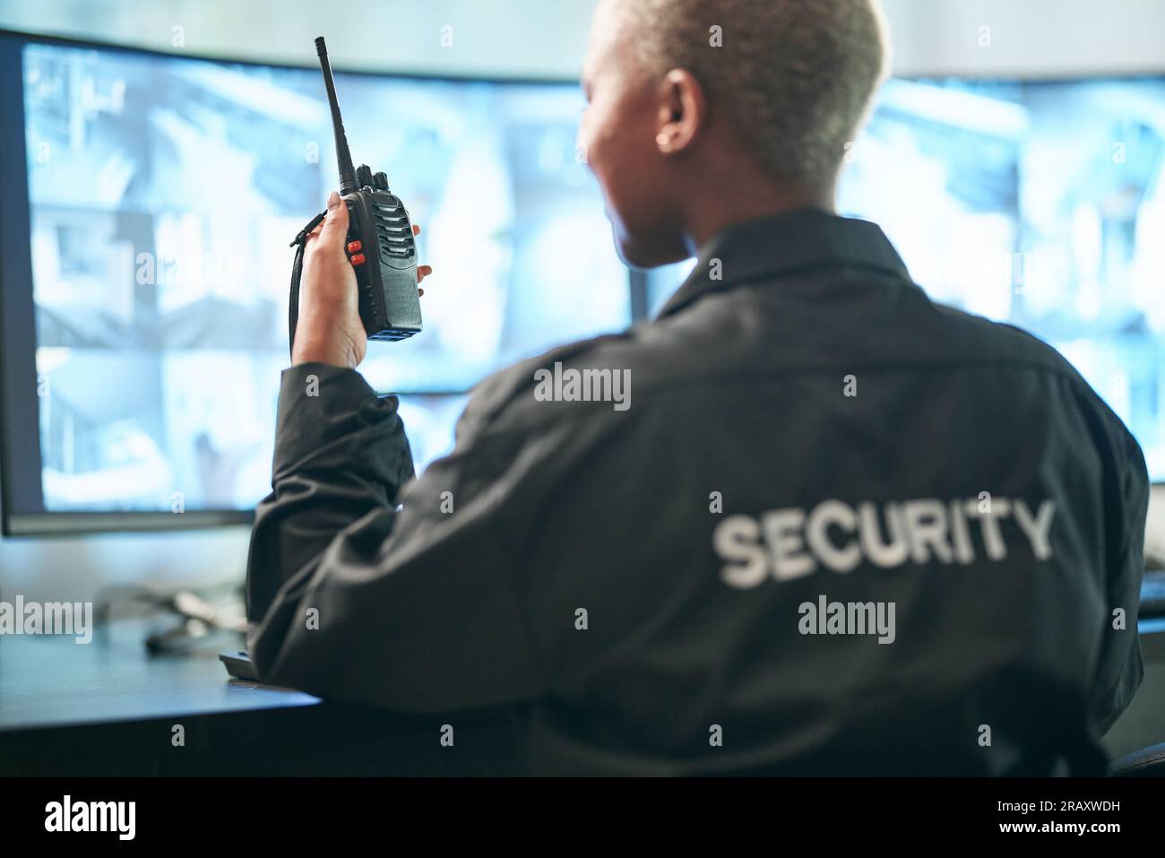 Back, security and radio surveillance with a woman officer in a control