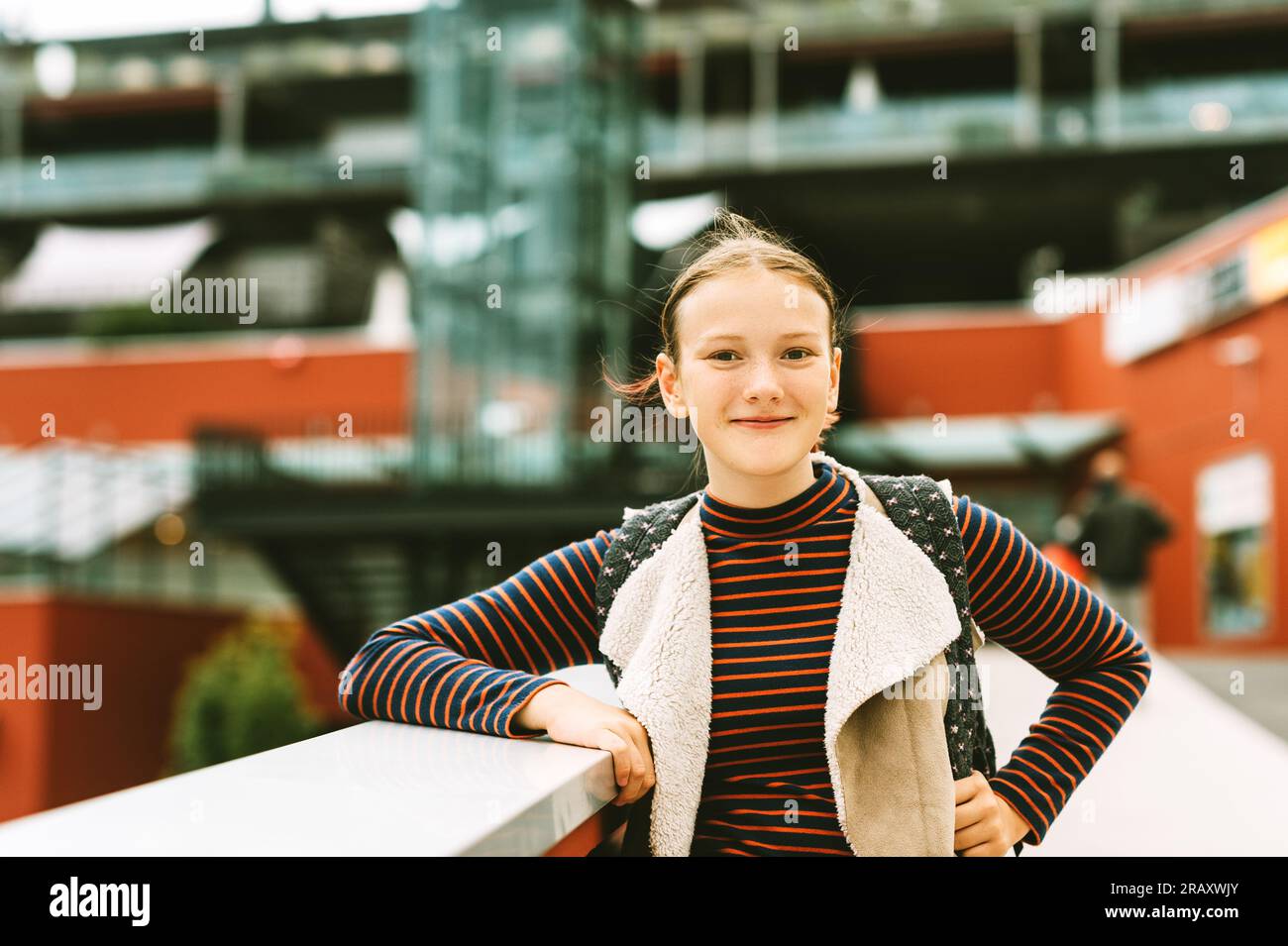 Outdoor portrait of young teenage girl with backpack Stock Photo - Alamy