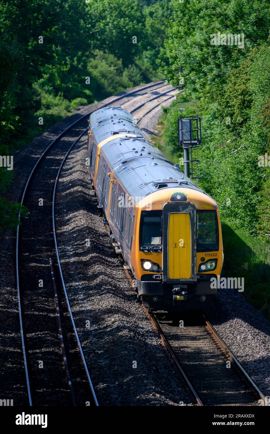 West Midlands Trains class 172 travelling along track in Warwickshire, England. Stock Photo