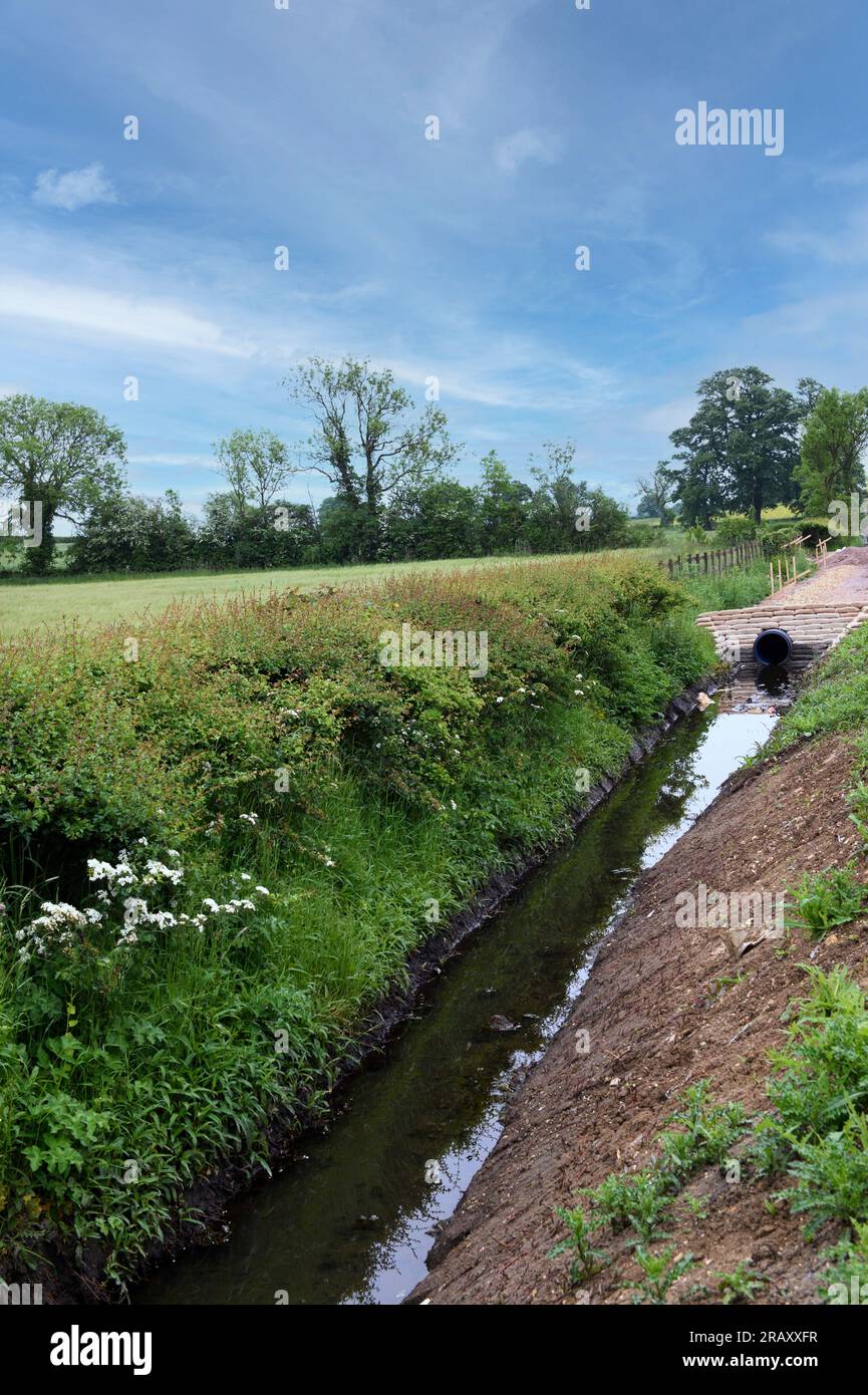 Drainage ditch at the side of a motorway in the UK Stock Photo Alamy