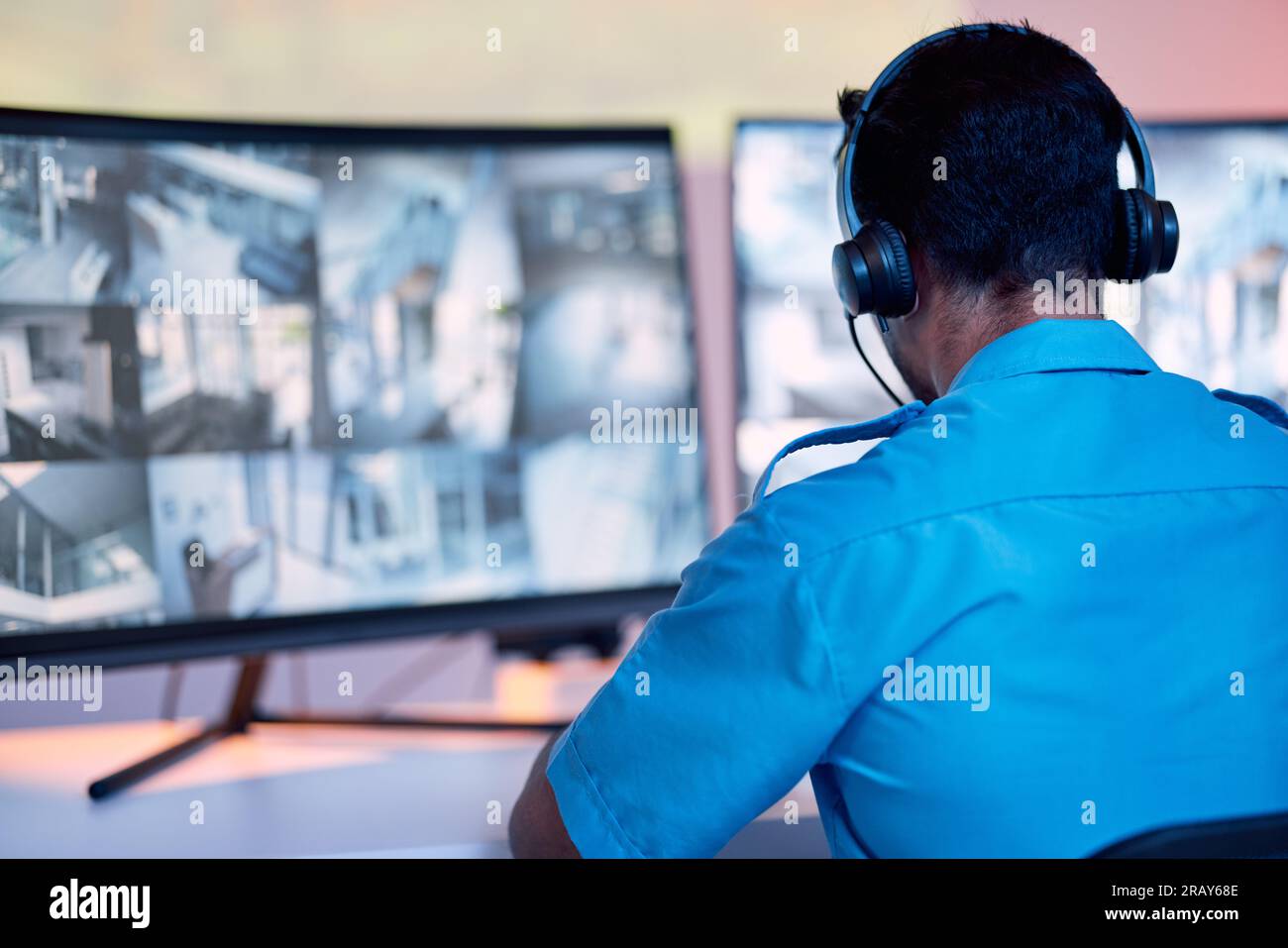 Security guard, headphones and cctv monitor, communication and