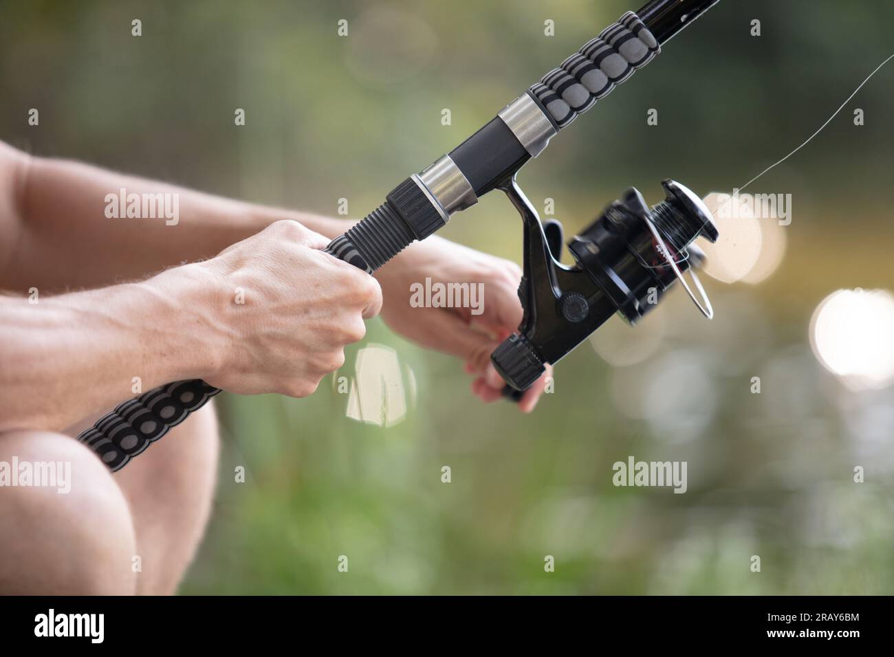 Spincast fishing reel hi-res stock photography and images - Alamy
