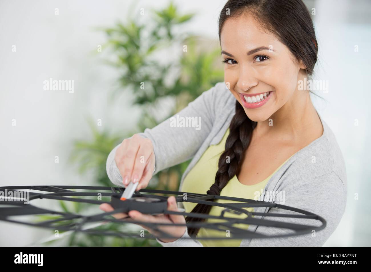portrait of a happy woman watchmaker Stock Photo