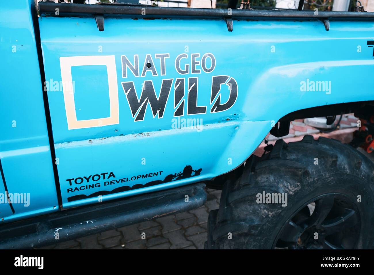 12 Ocotber 2022, Kemer, Antalya: Wheel and suspension system of a offroad monster car with Nat Geo Wild caption Stock Photo