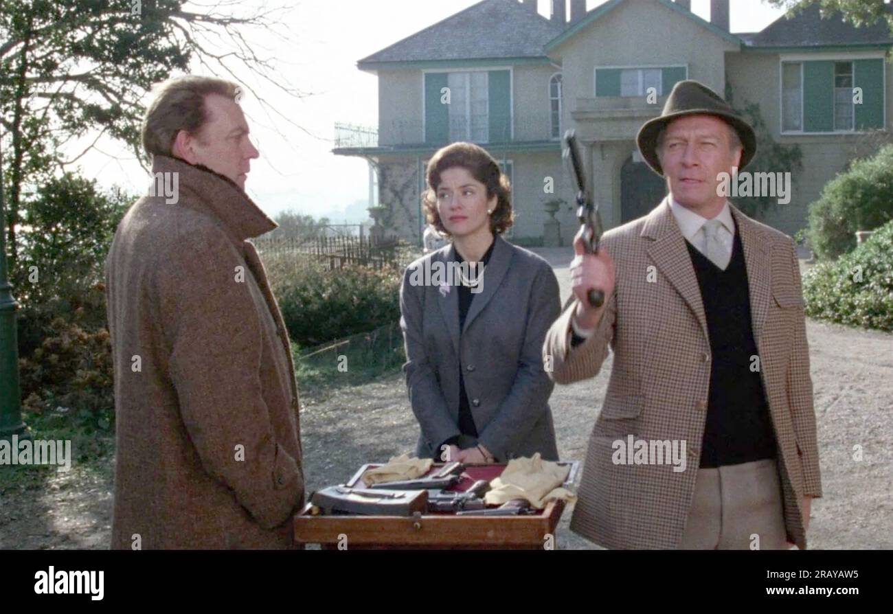 ORDEAL BY INNOCENCE f1984 Cannon Films movie with from left: Donald Sutherland, Diana Quick, Christopher Plummer Stock Photo