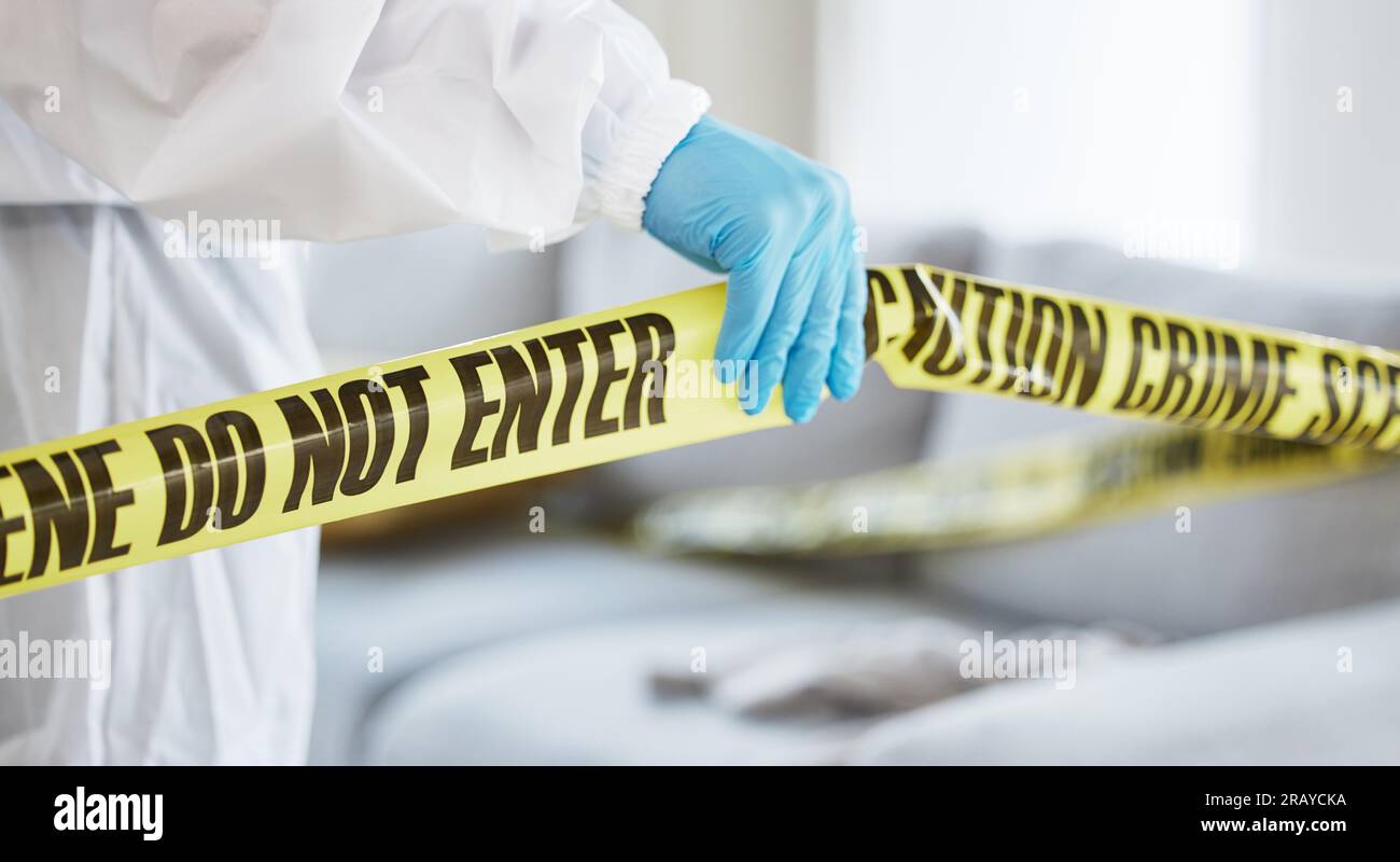 Forensics, crime scene and tape with investigator hand in house lounge