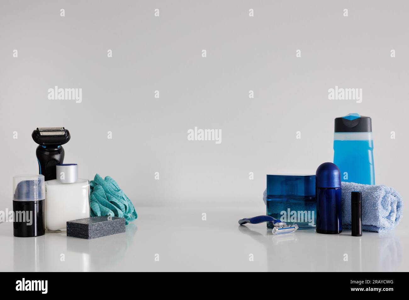 Set of different men's personal hygiene products on white background