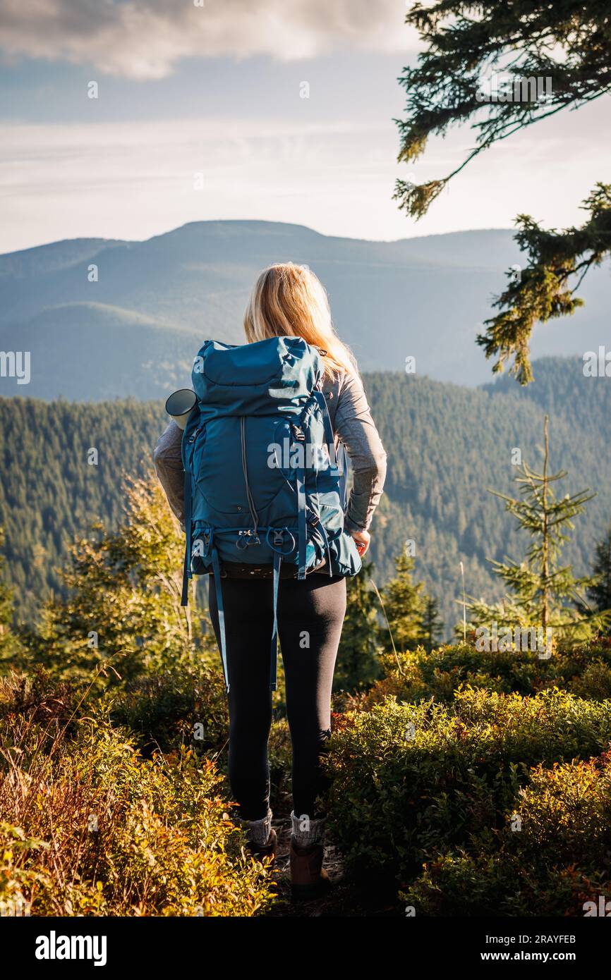 Woman with backpack in the czech mountains hi-res stock photography and ...