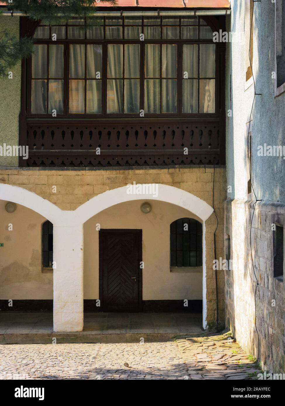vintage door and windows on the grunge facade. abandoned architecture exterior Stock Photo