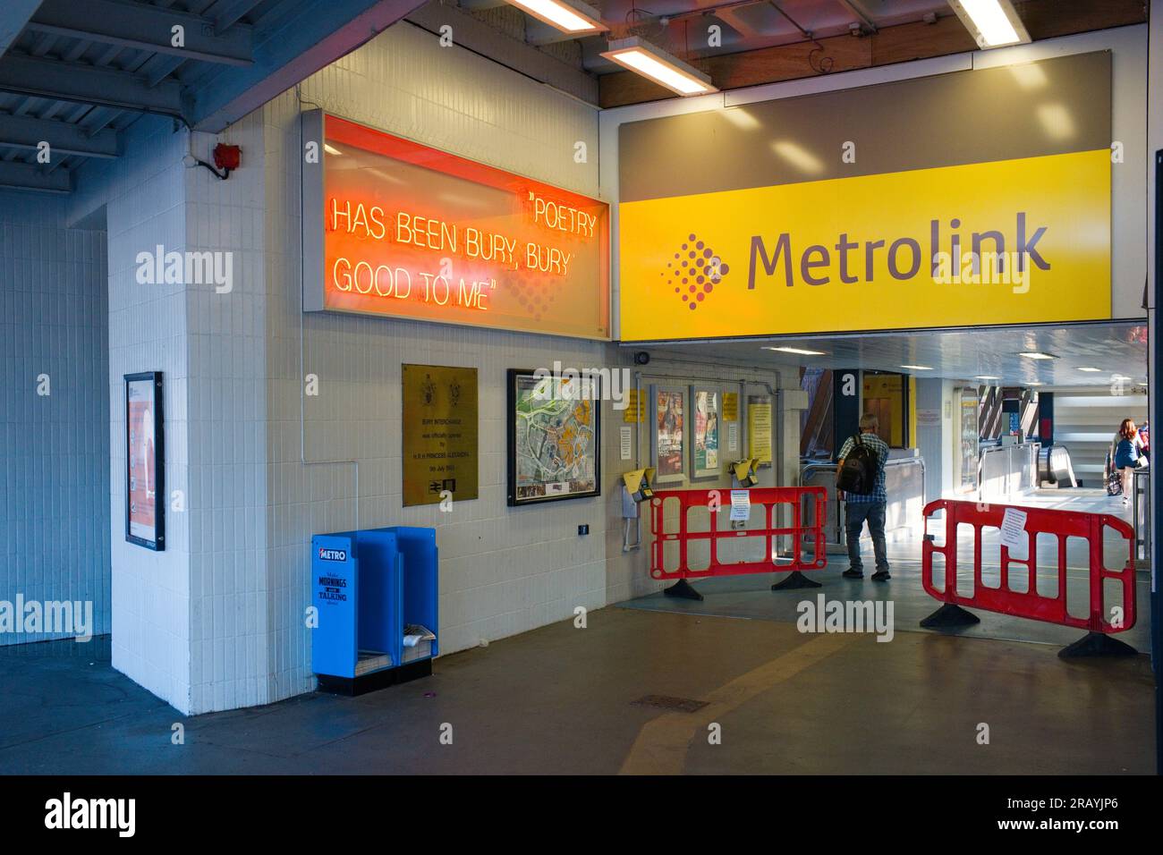 Entrance to the Metrolink station at Bury in Manchester with neon art installation by Tony Worrall Stock Photo