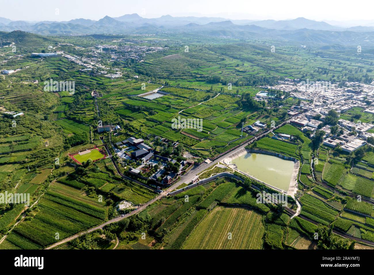 Anyang, China. 05th July, 2023. The Yuejin Canal is flowing through the farmland of Gujing village in Duli town, Anyang City, Henan Province, China, on July 4, 2023. It has diverted more than 3 billion cubic meters of water since 1977, irrigating an area of 12 million mu per time and increasing grain production by 300 million kilograms. (Photo by Costfoto/NurPhoto) Credit: NurPhoto SRL/Alamy Live News Stock Photo
