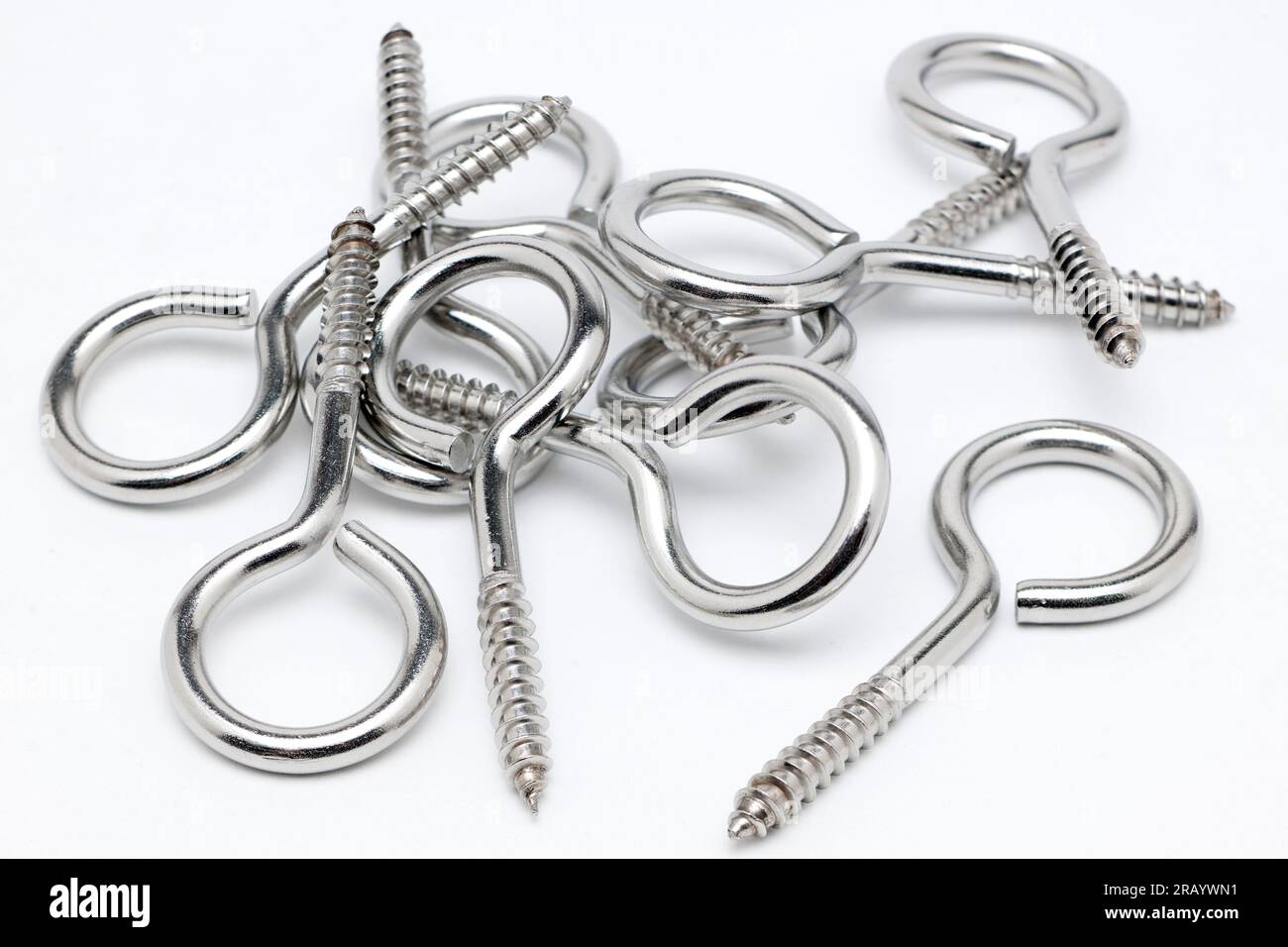 Pile of Stainless Steel Two Inch Eye Hooks Stock Photo
