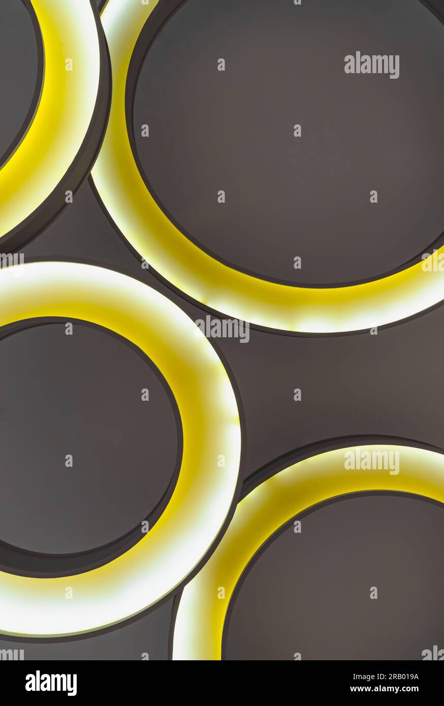 Look up to the round ceiling mounted light fixtures. Yellow circular