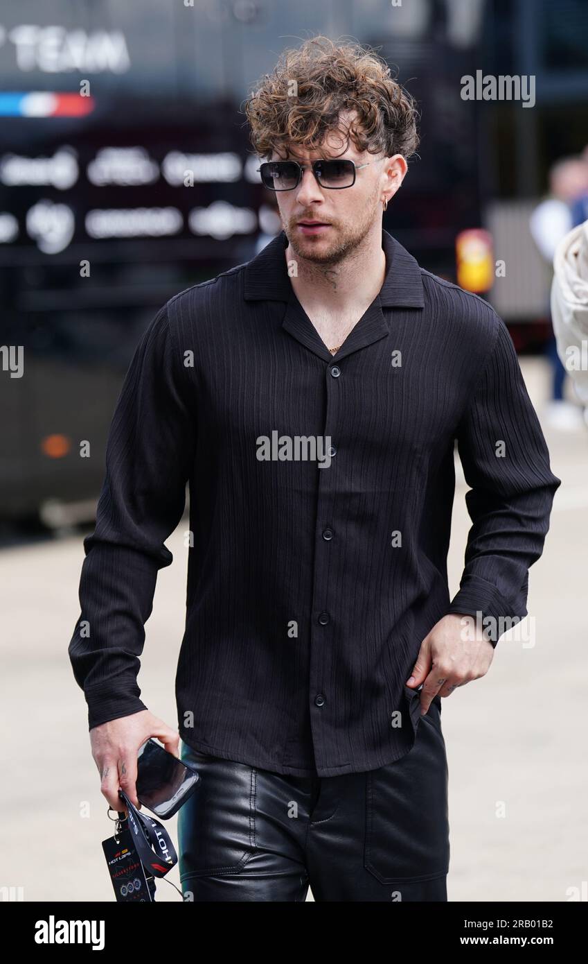 Singer-songwriter Tom Grennan on paddock day ahead of the British Grand Prix 2023 at Silverstone, Towcester. Picture date: Thursday July 6, 2022. Stock Photo