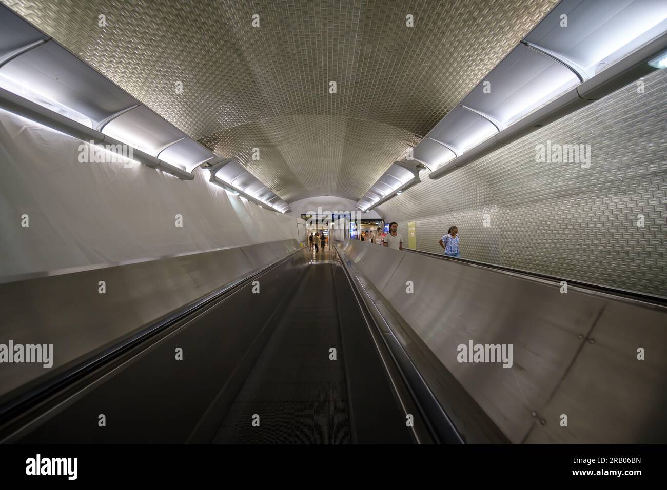 Paris, France - June 25, 2023 : People using the subway metro escalators in Paris France Stock Photo