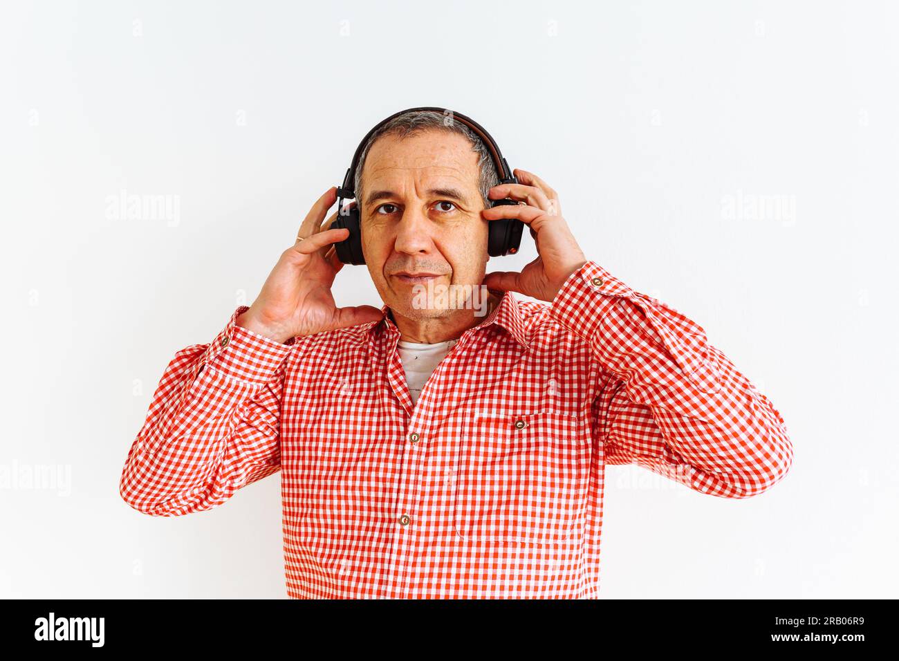 Portrait middle-aged man in headphones Stock Photo