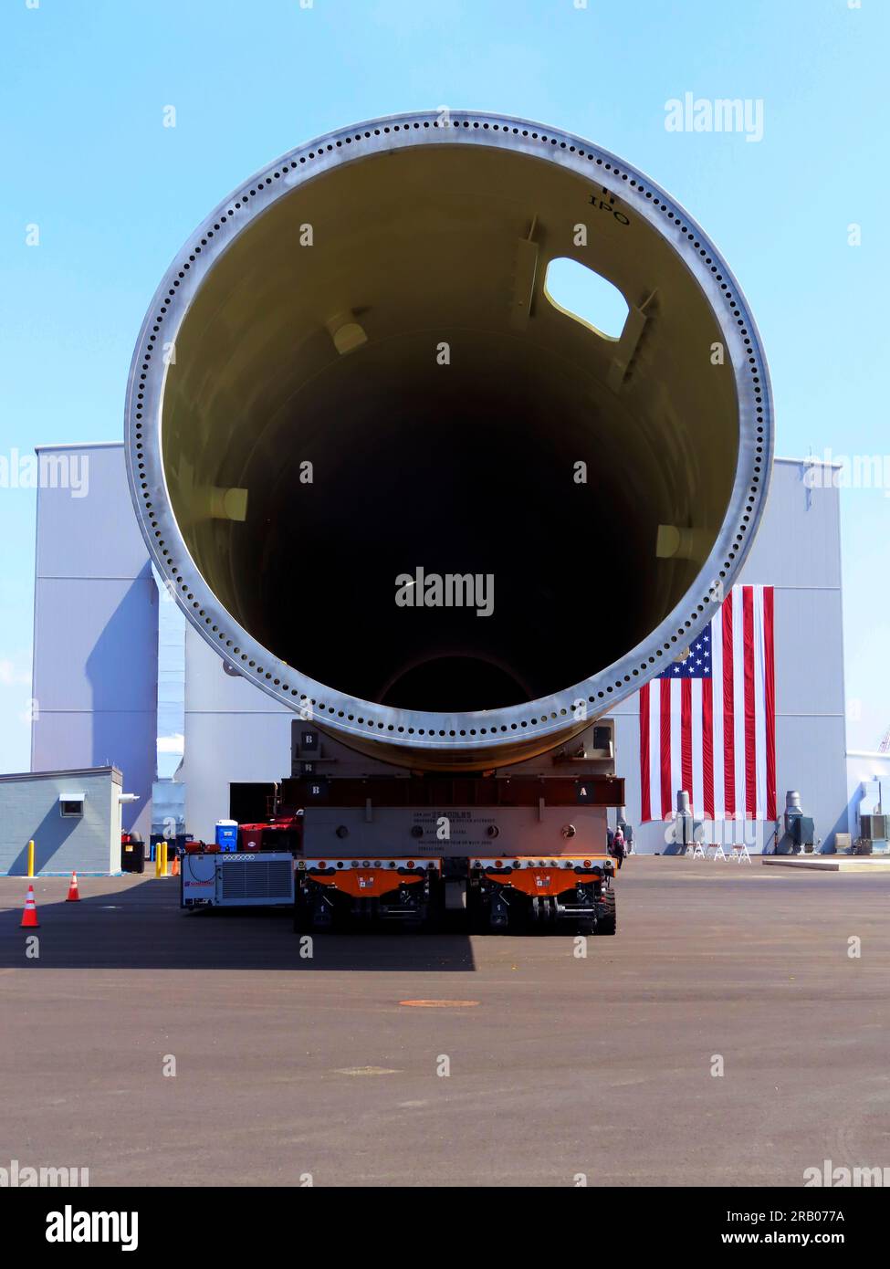 A giant monopile, the foundation for an offshore wind turbine, sits on