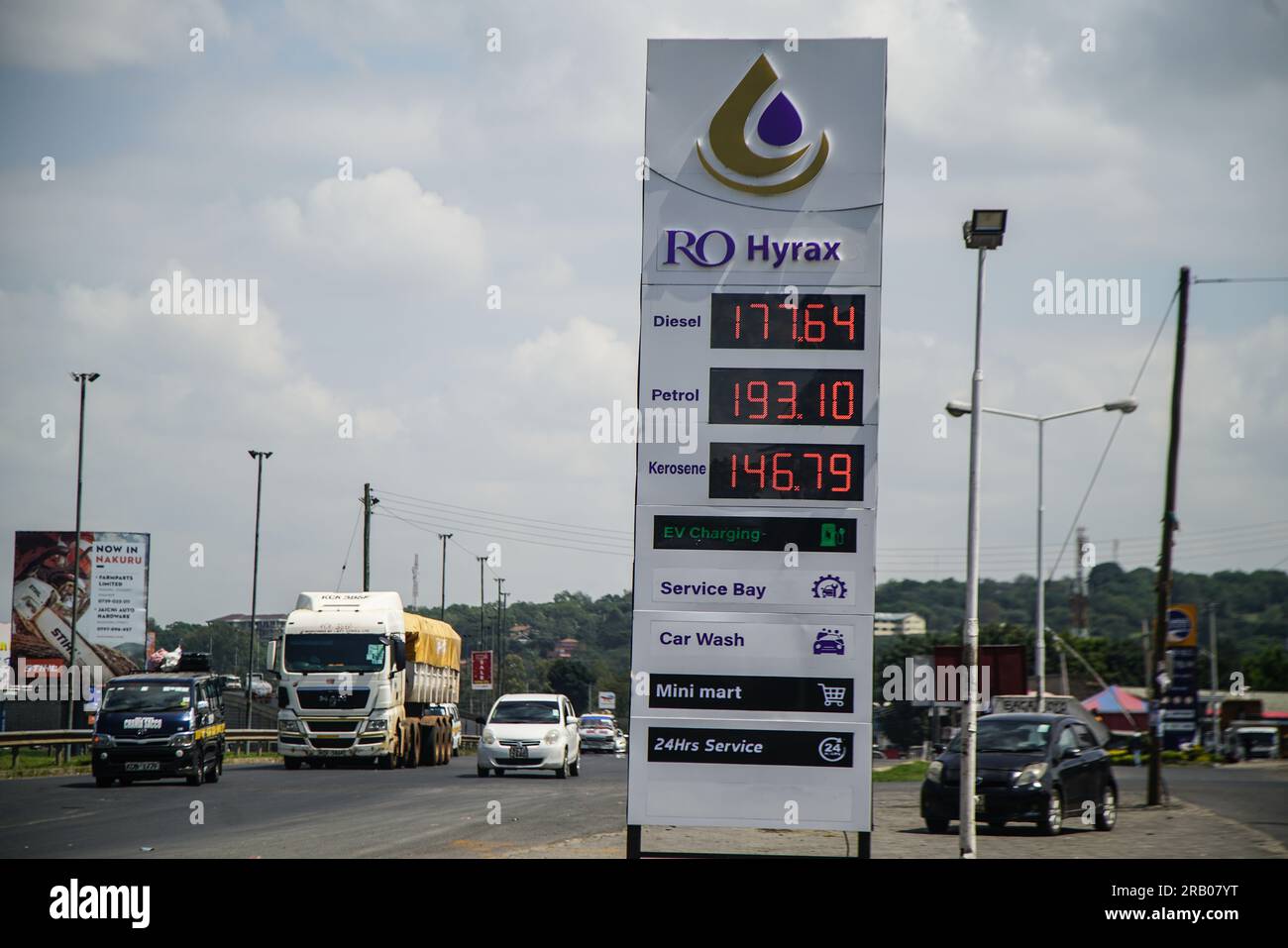 Nakuru, Kenya. 05th July, 2023. Motor vehicles, drive past a display board at petrol station showing recently increased fuel prices in Kenya. The cost of fuel shot upwards from 8% to 16% after the doubling of value added tax on fuel, following passing of the contentious Finance Act, 2023. (Photo by James Wakibia/SOPA Images/Sipa USA) Credit: Sipa USA/Alamy Live News Stock Photo