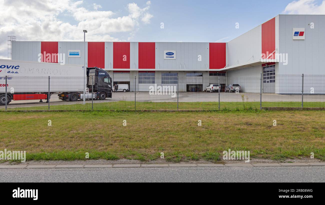 Simanovci, Serbia - August 22, 2022: Sanvik Carrier Mtu Companies Distribution Warehouse Industrial Building. Stock Photo