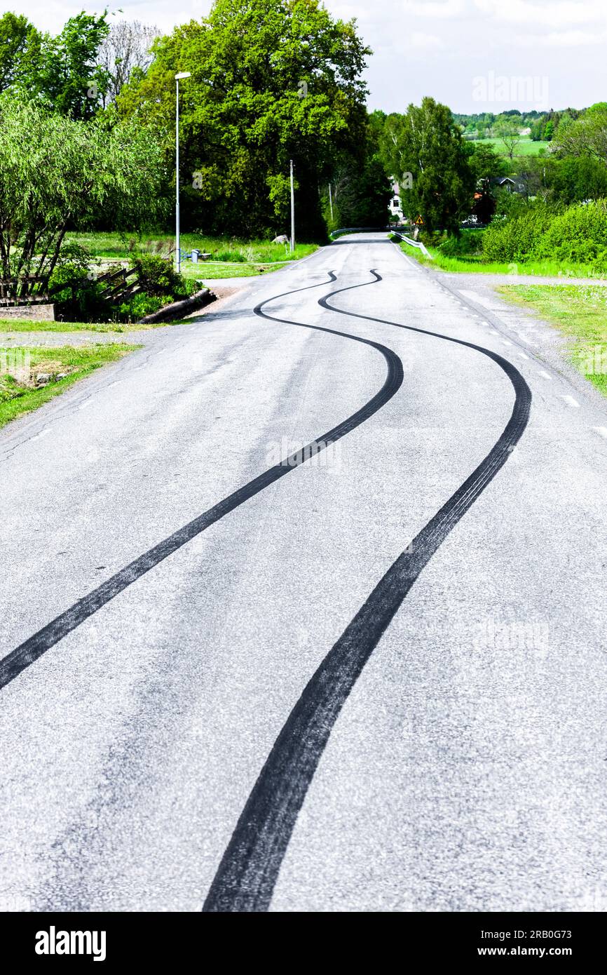 Skid marks on a road Stock Photo - Alamy