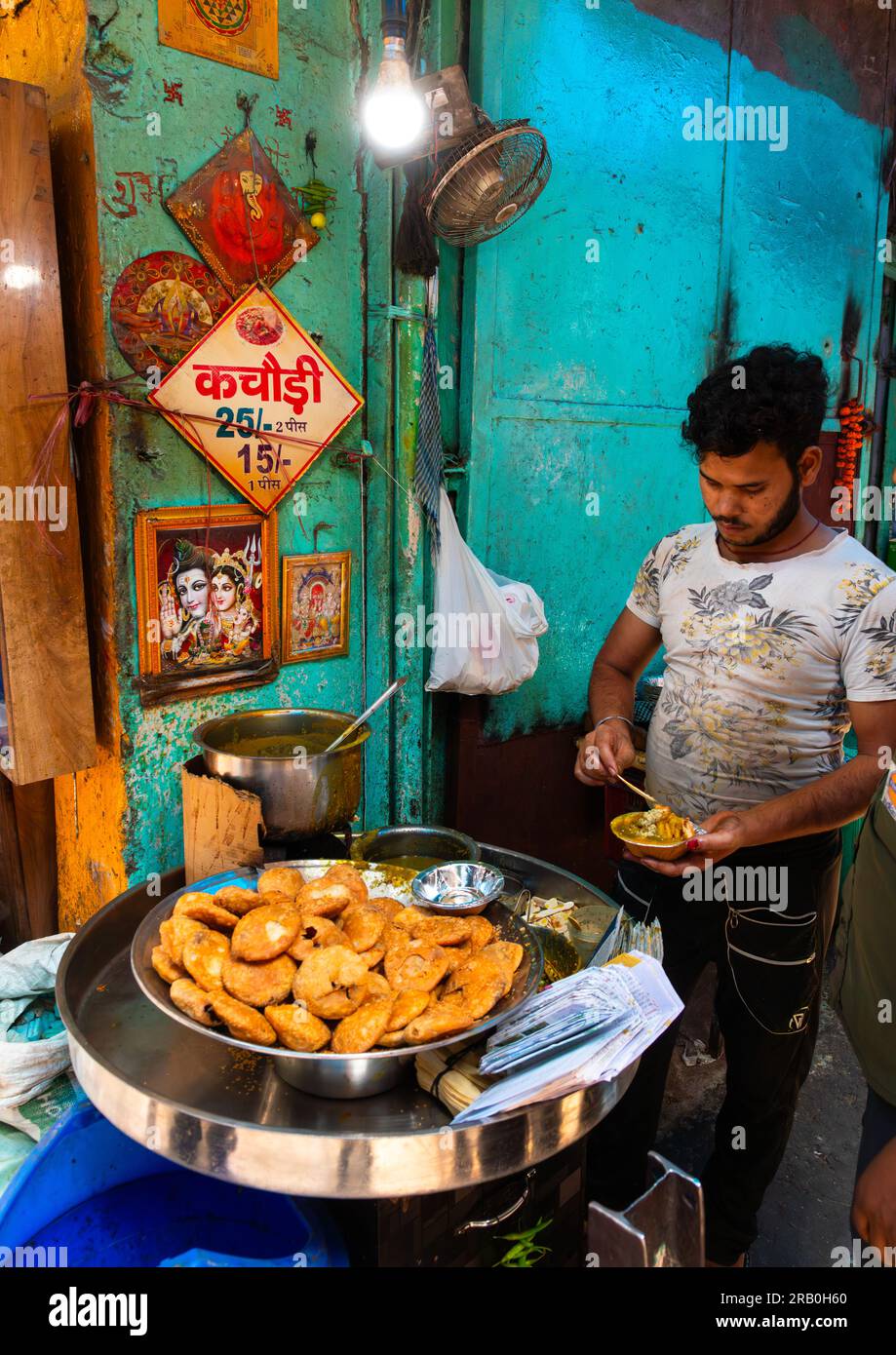 Indian man preparing food in the street in old Delhi, Delhi, New Delhi, India Stock Photo