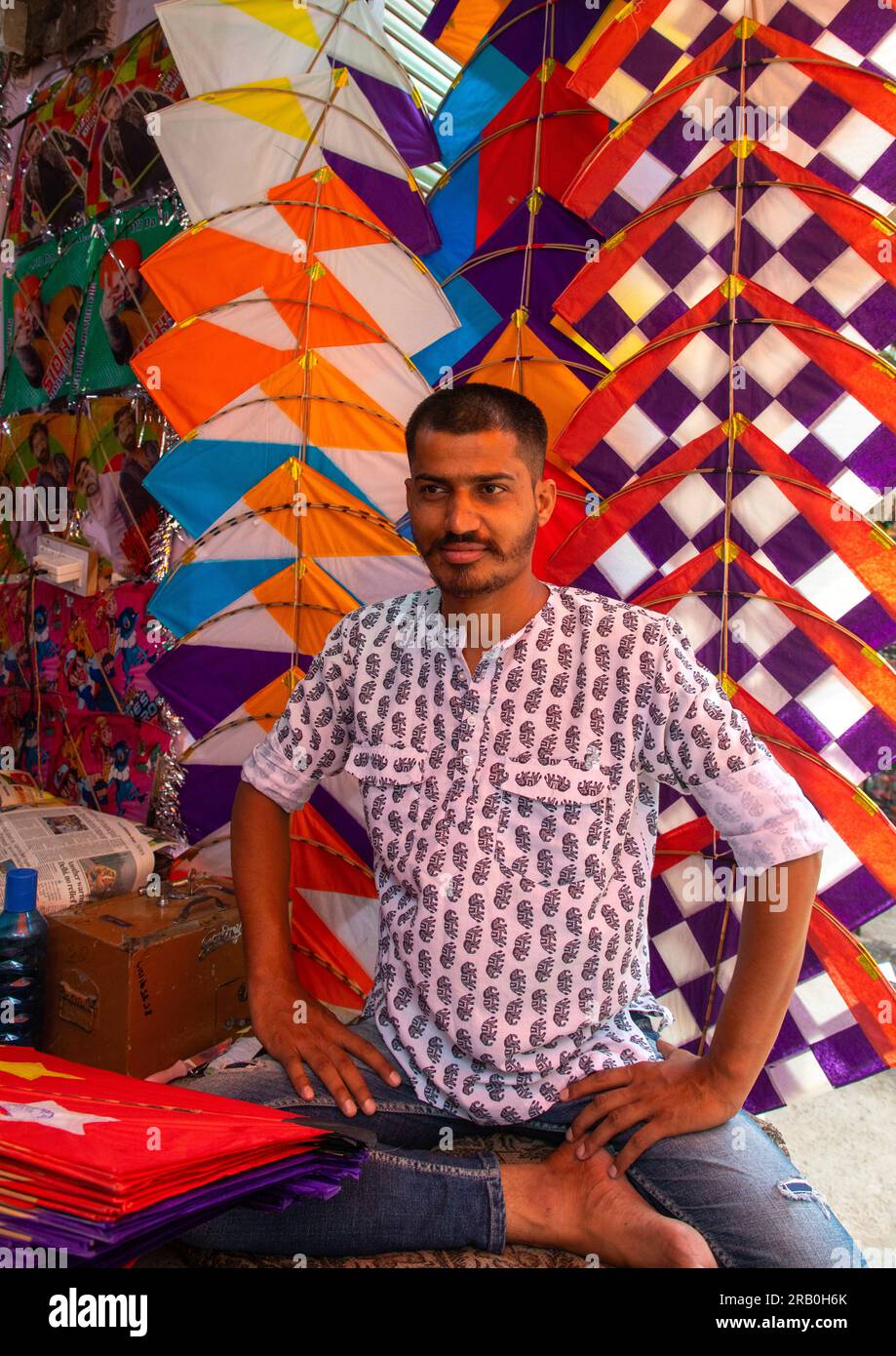 Indian seller in a kite shop in old Delhi, Delhi, New Delhi, India Stock Photo