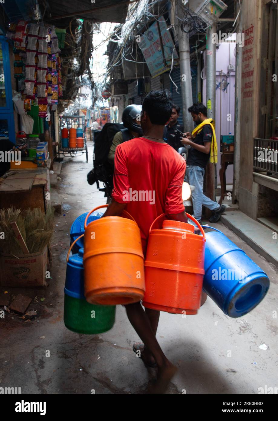 Indian man delivering drinking water in jerricans , Delhi, New Delhi ...