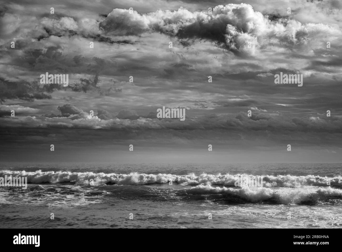 Dramatic landscape in black and white of the Costa Brava on a day with Tramontana wind in the province of Girona in Spain Stock Photo