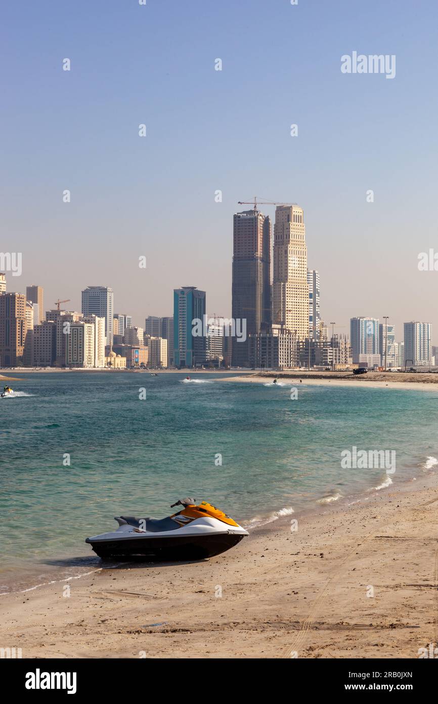 Motorboat  moored on a sandy beach at Sharjah UAE Stock Photo