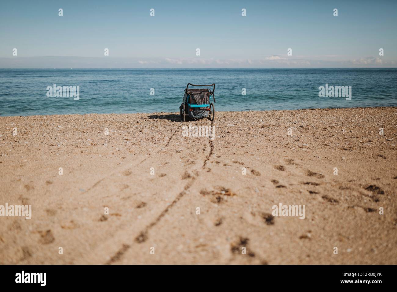 Stroller on the beach Stock Photo Alamy