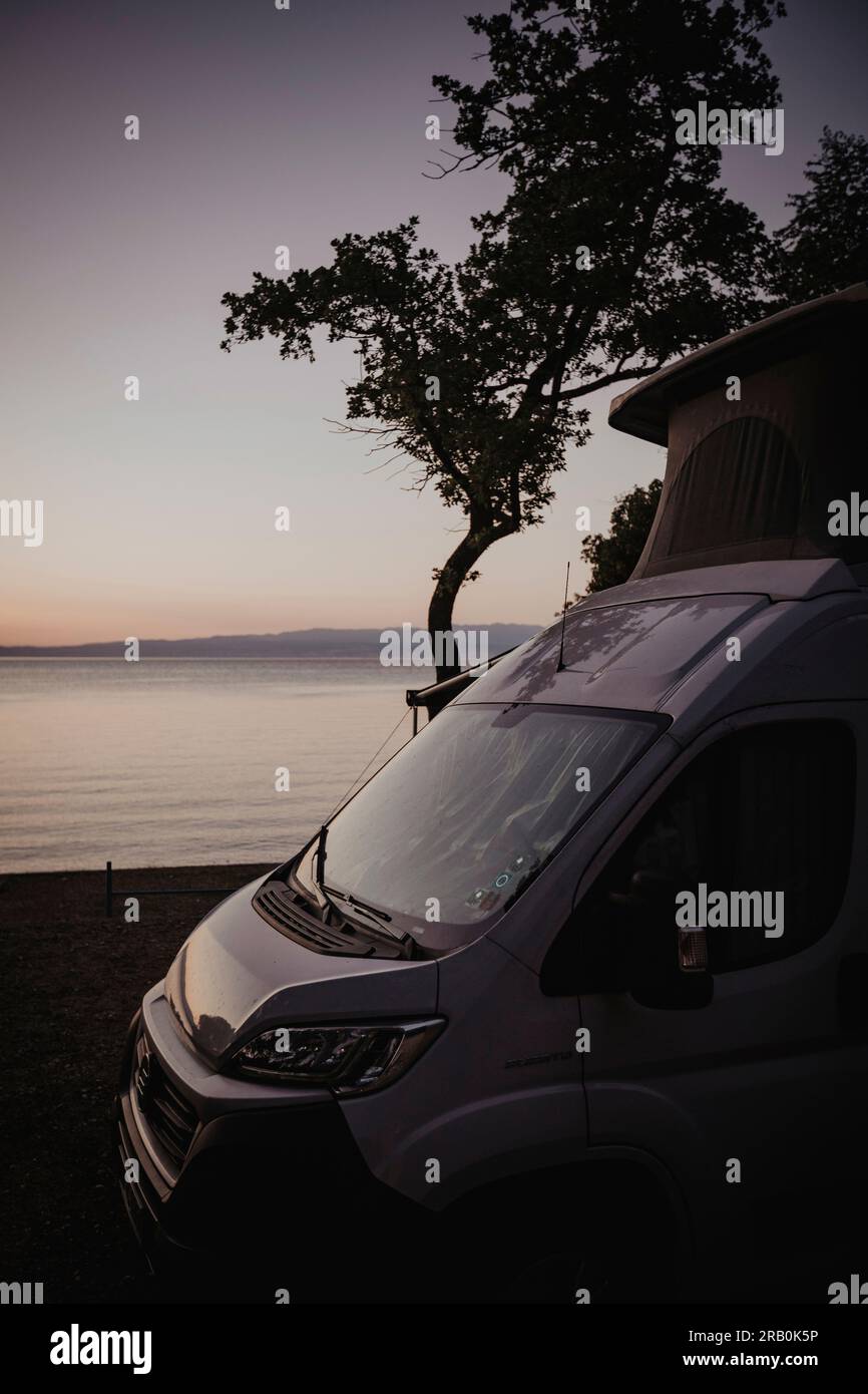 Motorhome stands on campsite by the sea Stock Photo - Alamy