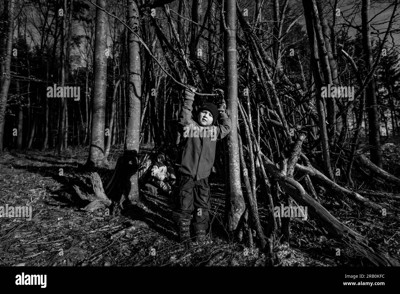 Brother and sister playing in the forest Stock Photo - Alamy