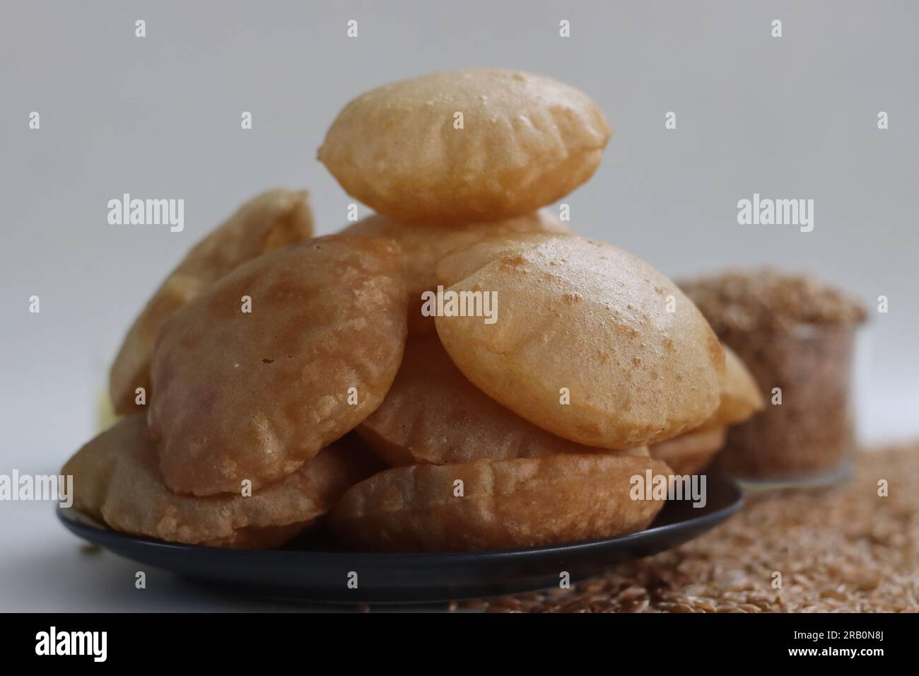 Khapli wheat puris. Deep fried Indian flatbread made of emmer wheat