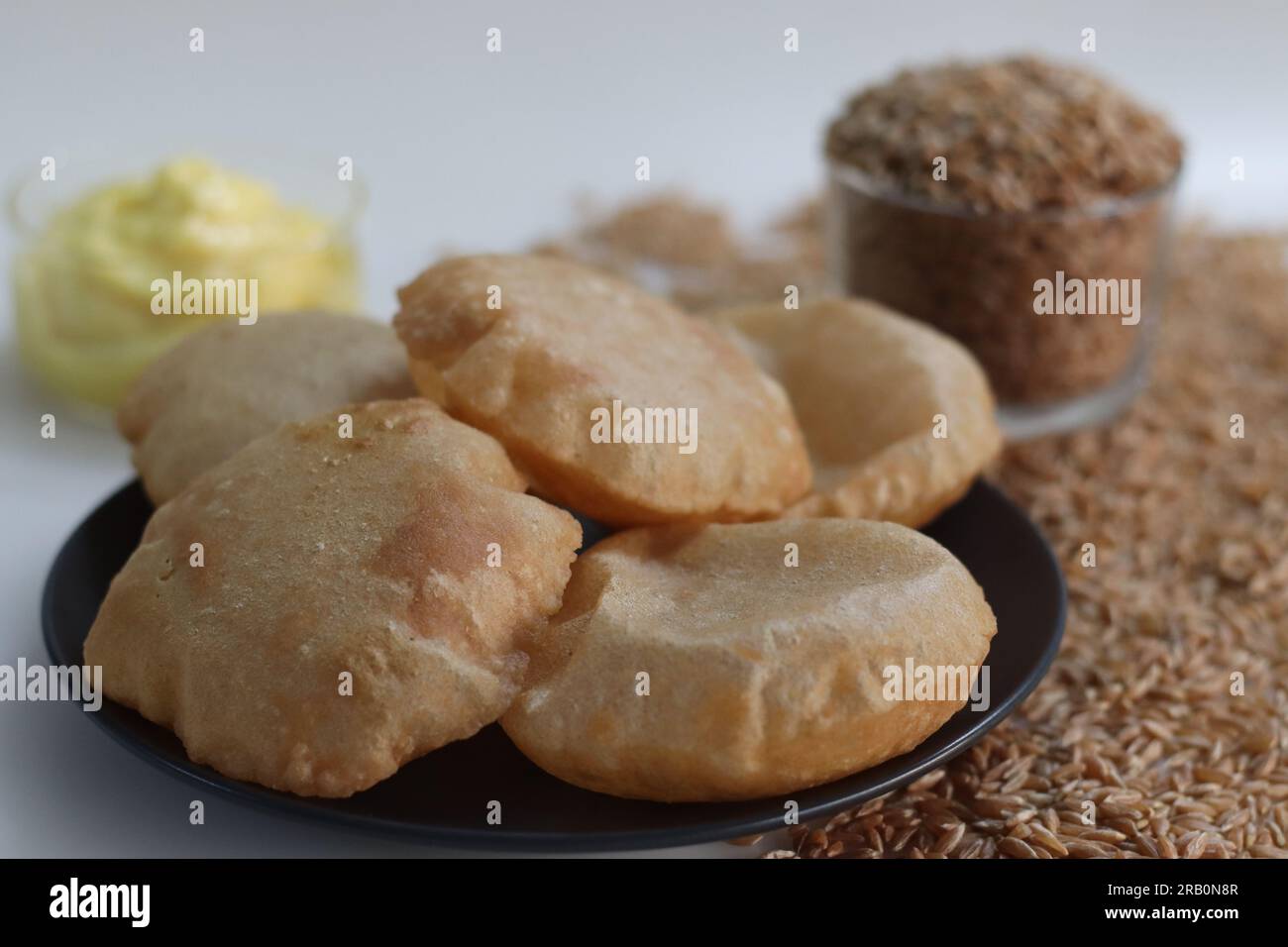 Khapli wheat puris. Deep fried Indian flatbread made of emmer wheat
