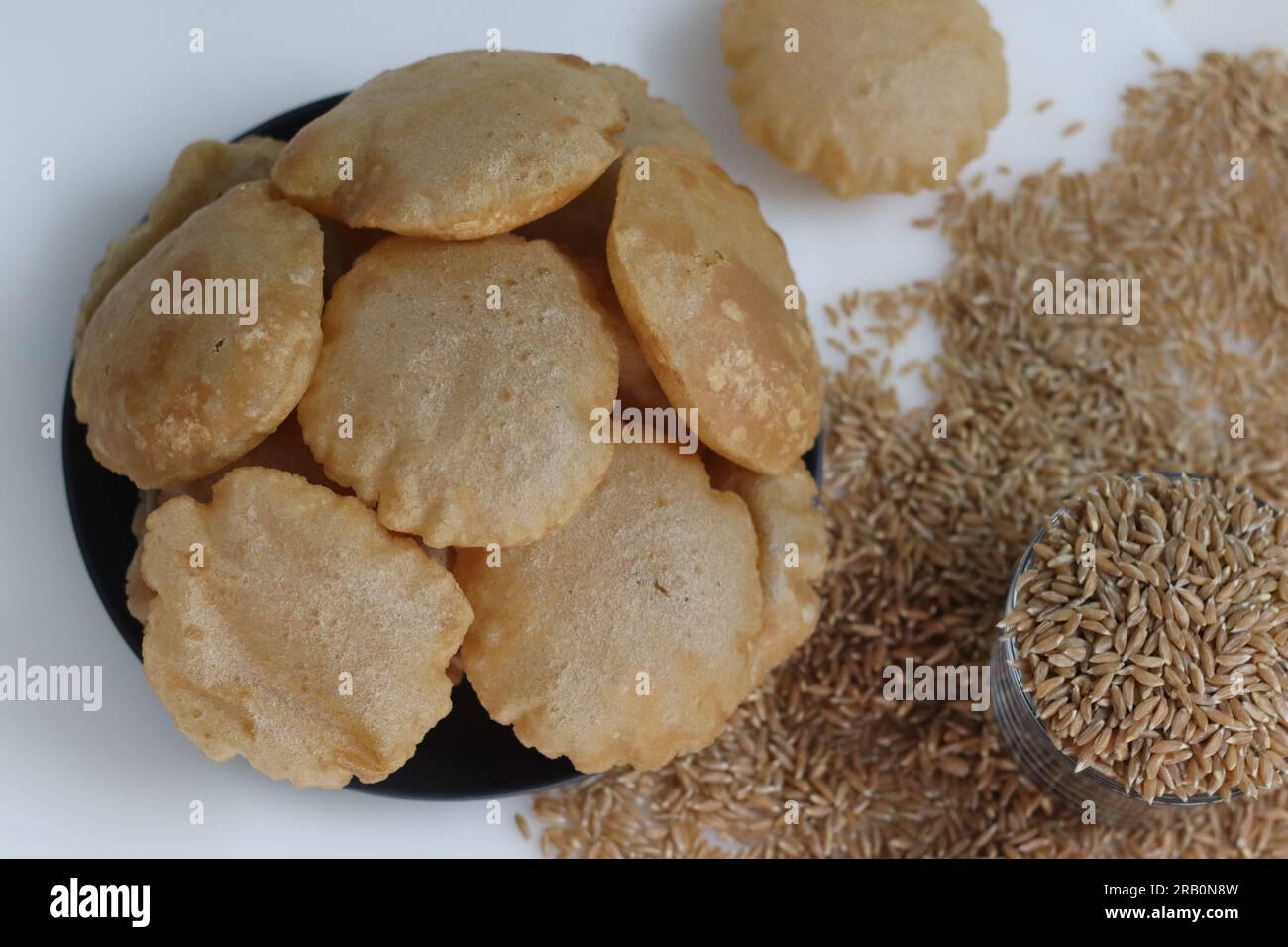 Khapli wheat puris. Deep fried Indian flatbread made of emmer wheat
