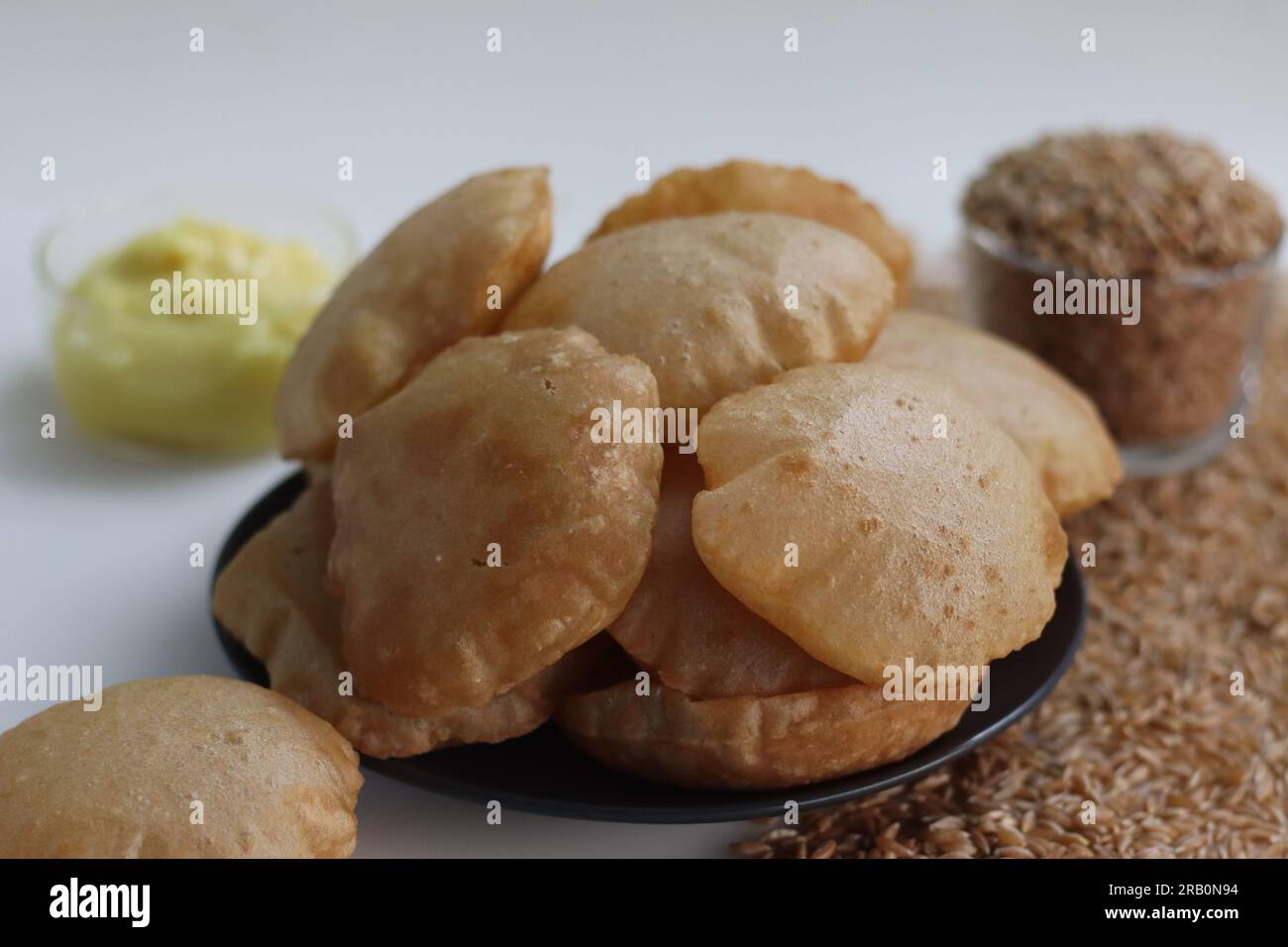 Khapli wheat puris. Deep fried Indian flatbread made of emmer wheat
