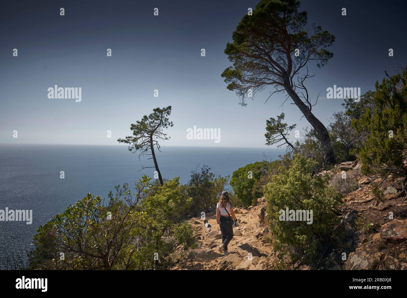 Girl with dog hiking to cinque terre hi-res stock photography and ...