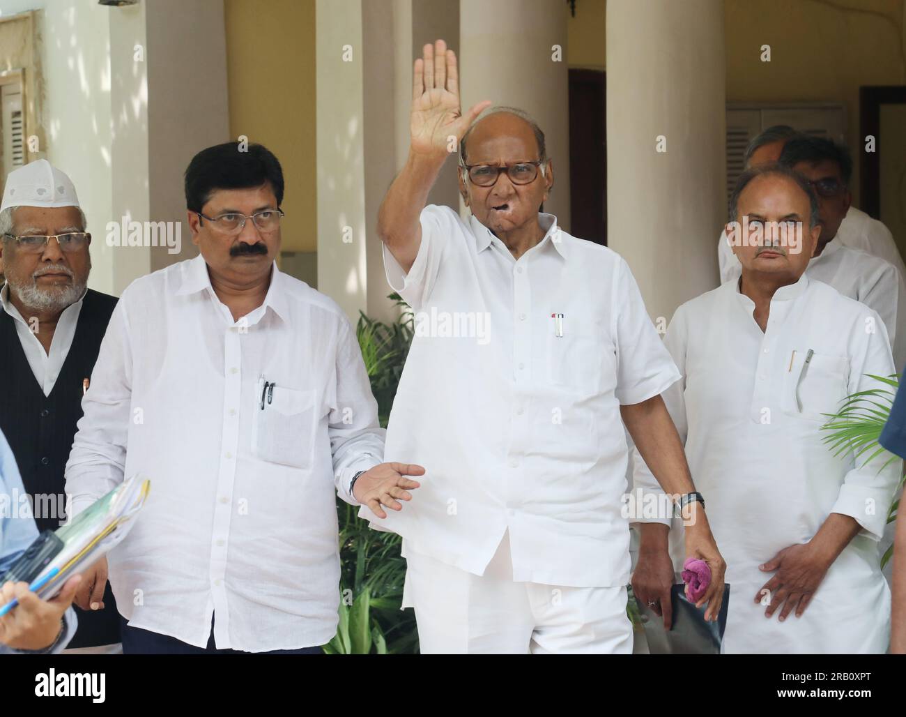 New Delhi, India. 06th July, 2023. Nationalist Congress Party (NCP) President Sharad Pawar (center) arrives to addresses the media after NCP Working Committee meeting at his residence, in New Delhi. Sharad Pawar said 'I am the President of the party. The NCP working committee approved the decision to expel rebel leaders Ajit Pawar and nine others who were sworn in as minister in the Shinde-Fadnavis Government for indulging in anti-party activities. Credit: SOPA Images Limited/Alamy Live News Stock Photo