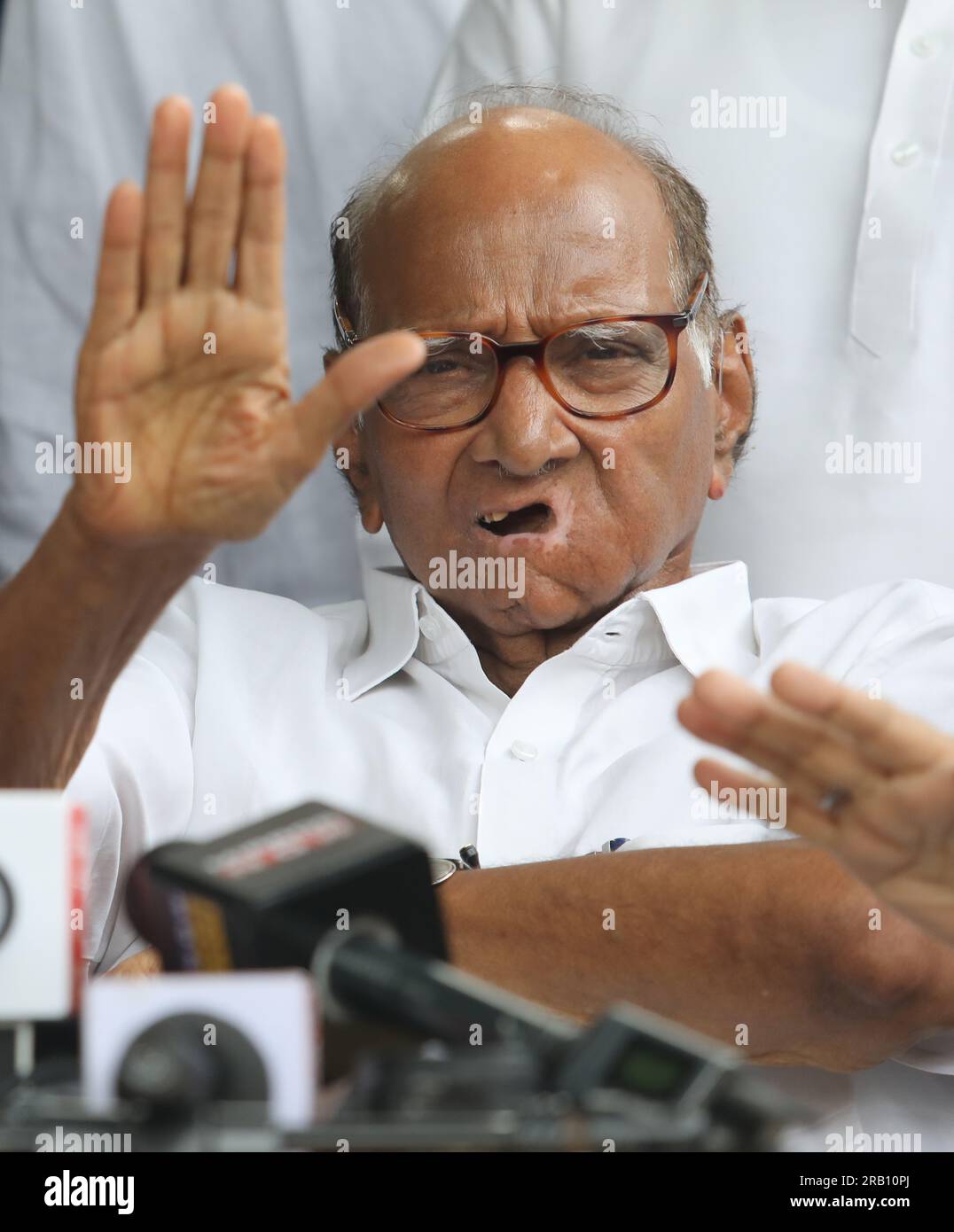New Delhi, India. 06th July, 2023. Nationalist Congress Party (NCP) President Sharad Pawar (center) addresses the media after the NCP Working Committee meeting at his residence, in New Delhi. Sharad Pawar said 'I am the President of the party. The NCP working committee approved the decision to expel rebel leaders Ajit Pawar and nine others who were sworn in as minister in the Shinde-Fadnavis Government for indulging in anti-party activities. (Photo by Naveen Sharma/SOPA Images/Sipa USA) Credit: Sipa USA/Alamy Live News Stock Photo