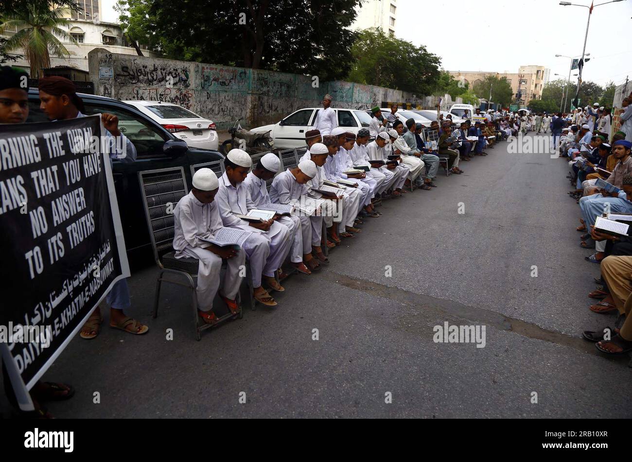 Hyderabad, Pakistan, July 6, 2023. Members of Fidaiyan-e-Khatm-e-Nabuwwat are reciting Quran as they are holding protest demonstration against desecration of Holy Quran in Sweden, at Karachi press club on Thursday, July 6, 2023. Stock Photo