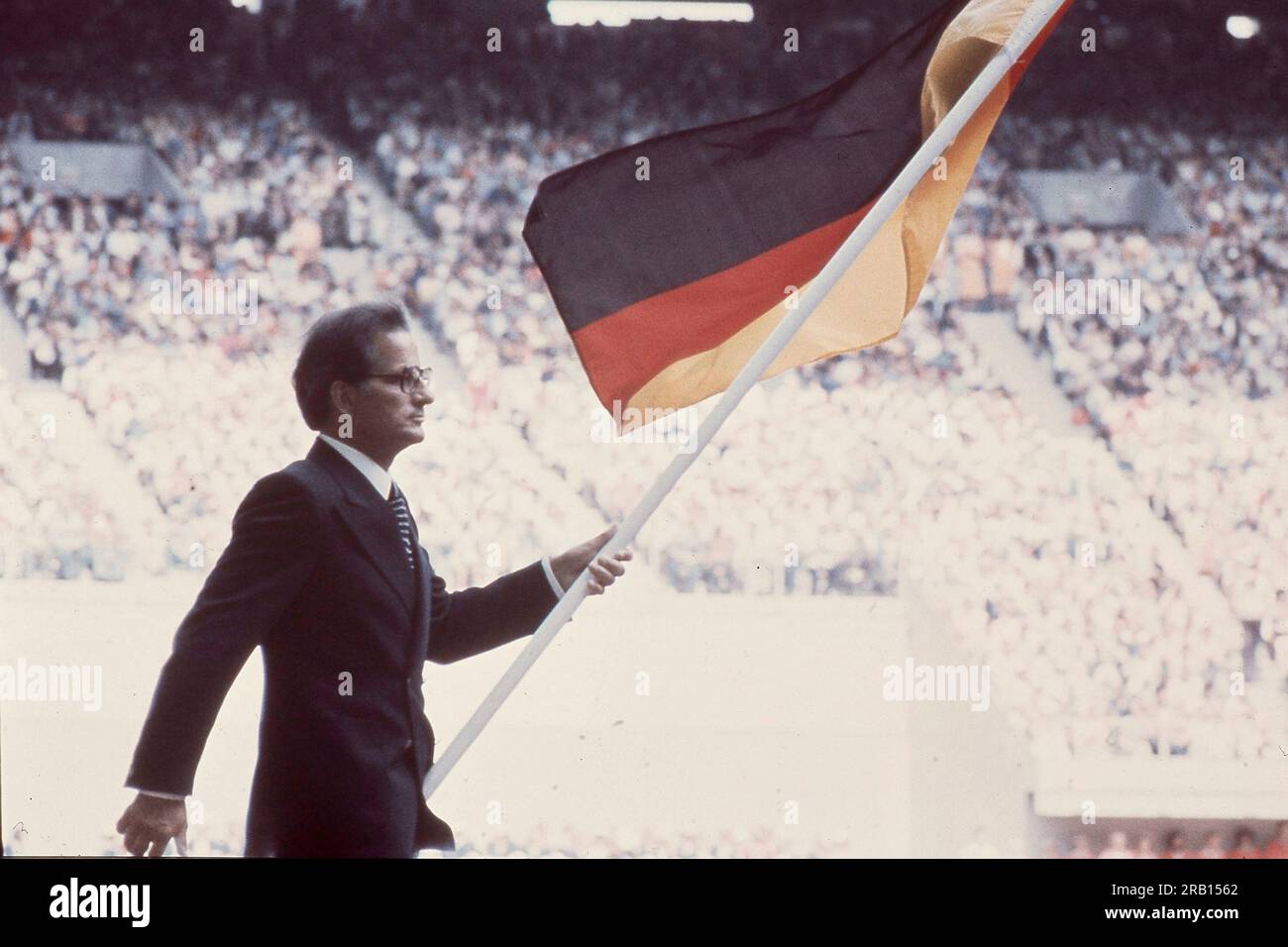 ARCHIVE PHOTO: 5 years ago, on July 9th, 2018, Hans-Guenter WINKLER died, arrival of the nations, invasion, Hans Gunether WINKLER (GÃ nther), riding, rider, carrying the German flag, flag, FRG, Germany, opening ceremony on 17.07. 1976 Games of the XXI. Olympic Games Summer Games 1976 in Montreal/Canada from 17.07. to 08/01/1976. ÂSven Simon # Princess-Luise-Str. 41 # 45479 M uelheim/R uhr # Tel. 0208/9413250 # Fax. 0208/9413260 # Account 244 293 433 # P ostbank Essen # BLZ 360 100 43 # e-mail: svensimon@t-online.de #www.SvenSimon.net. Stock Photo