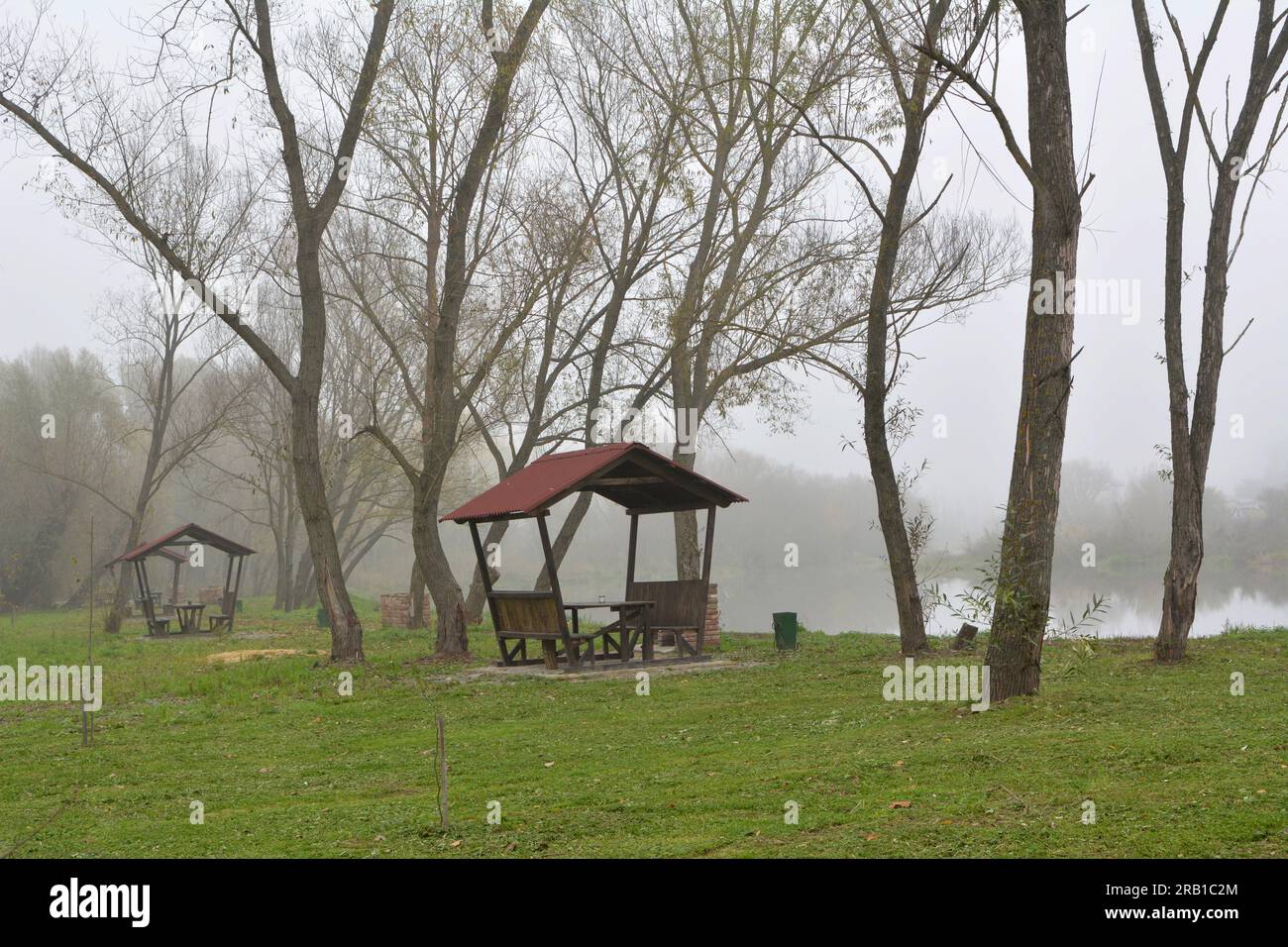 Wooden gazebo by the river in the autumn morning Stock Photo - Alamy