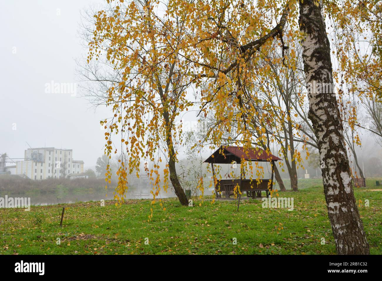 Wooden gazebo by the river in the autumn morning Stock Photo - Alamy
