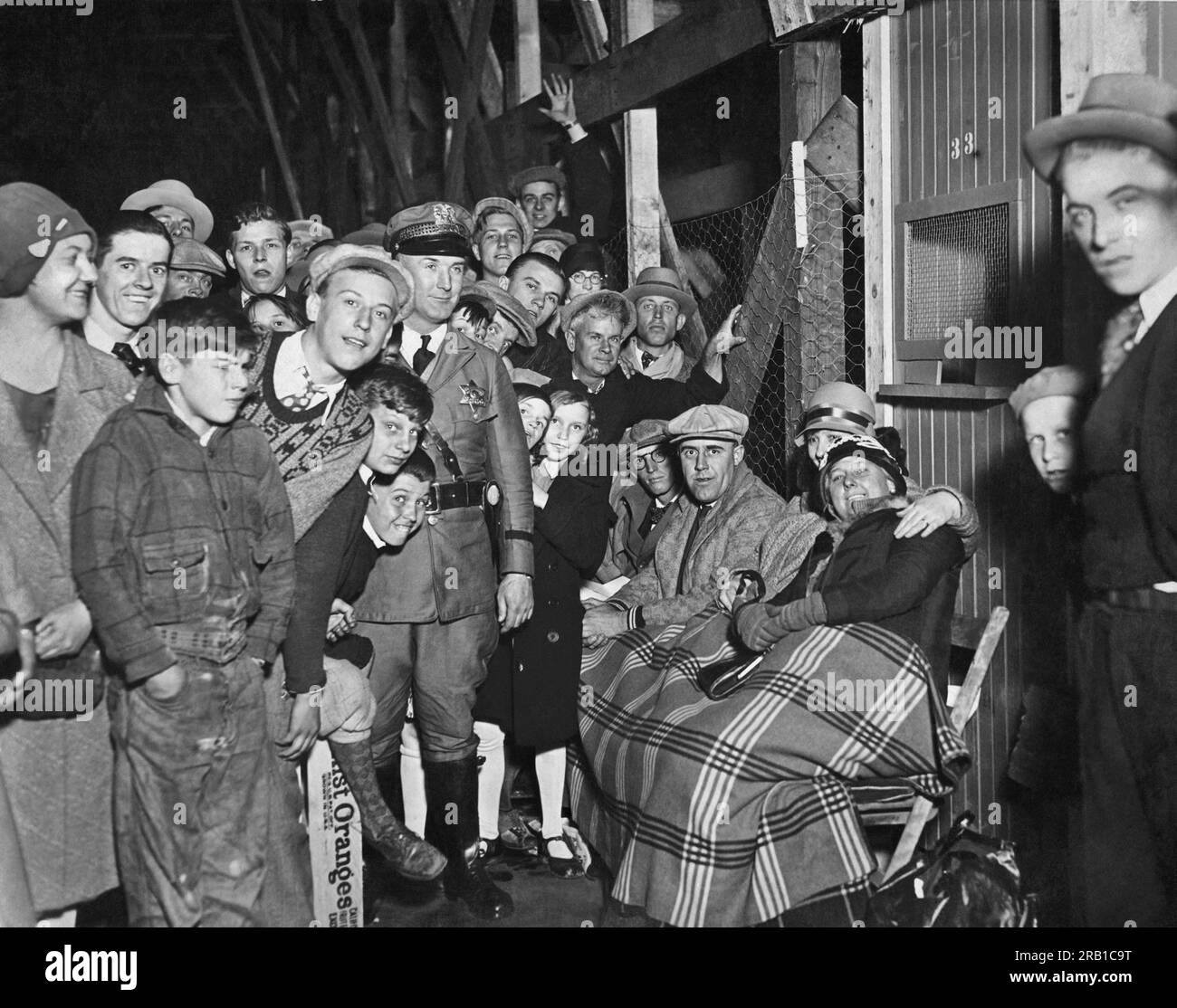 Chicago, Illinois:  October 8, 1929 Chicago Cubs baseball fans in line at 10 PM at Cubs Park to get grand stand tickets for the next day World Series game against the Philadelphia Athletics. Stock Photo