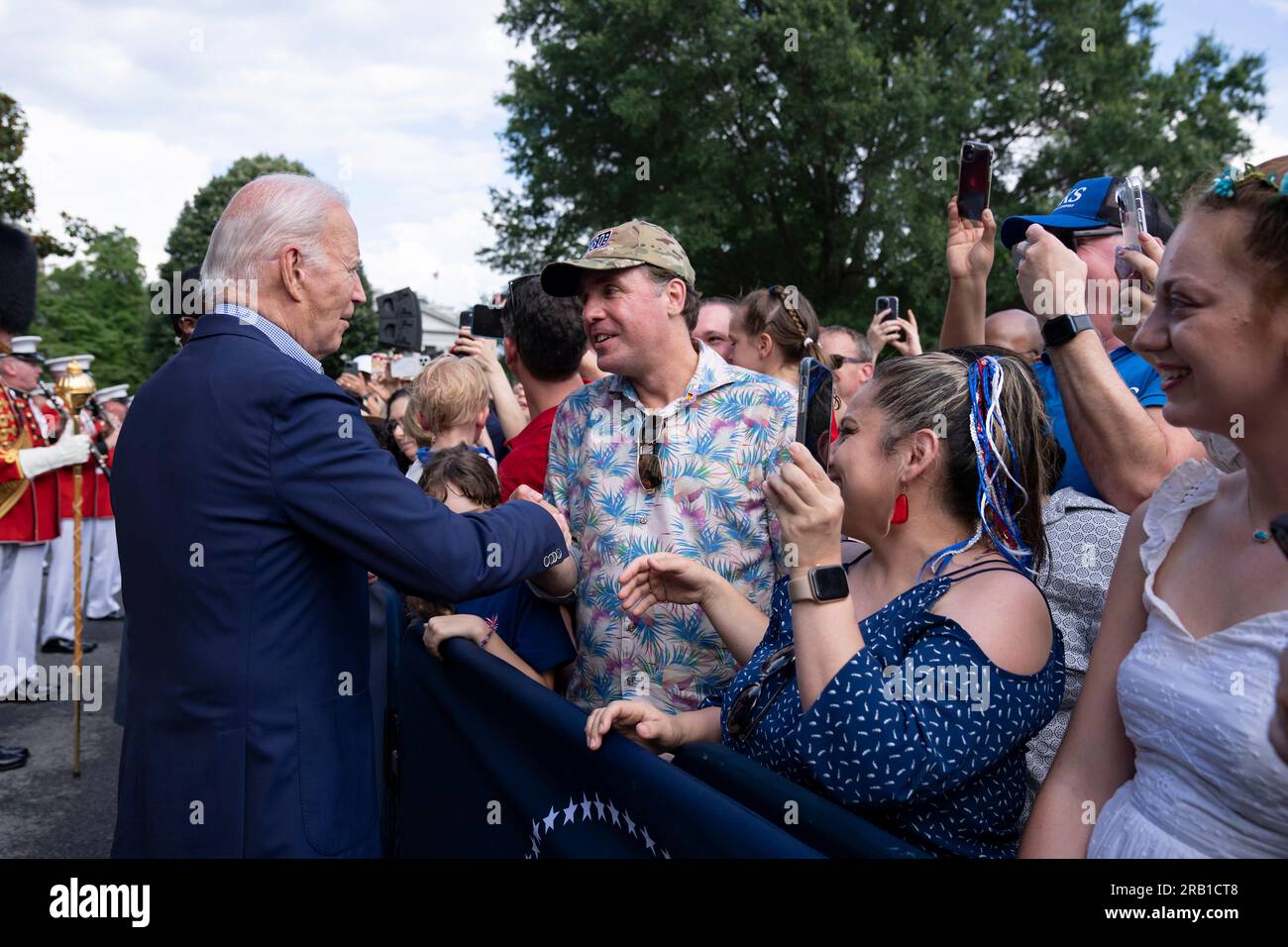 Washington, United States of America. 04 July, 2023. U.S President Joe Biden, left, greets active military and veteran families during Independence Day celebrations on the South Lawn of the White House, July 4, 2023 in Washington, D.C. Credit: Adam Schultz/White House Photo/Alamy Live News Stock Photo