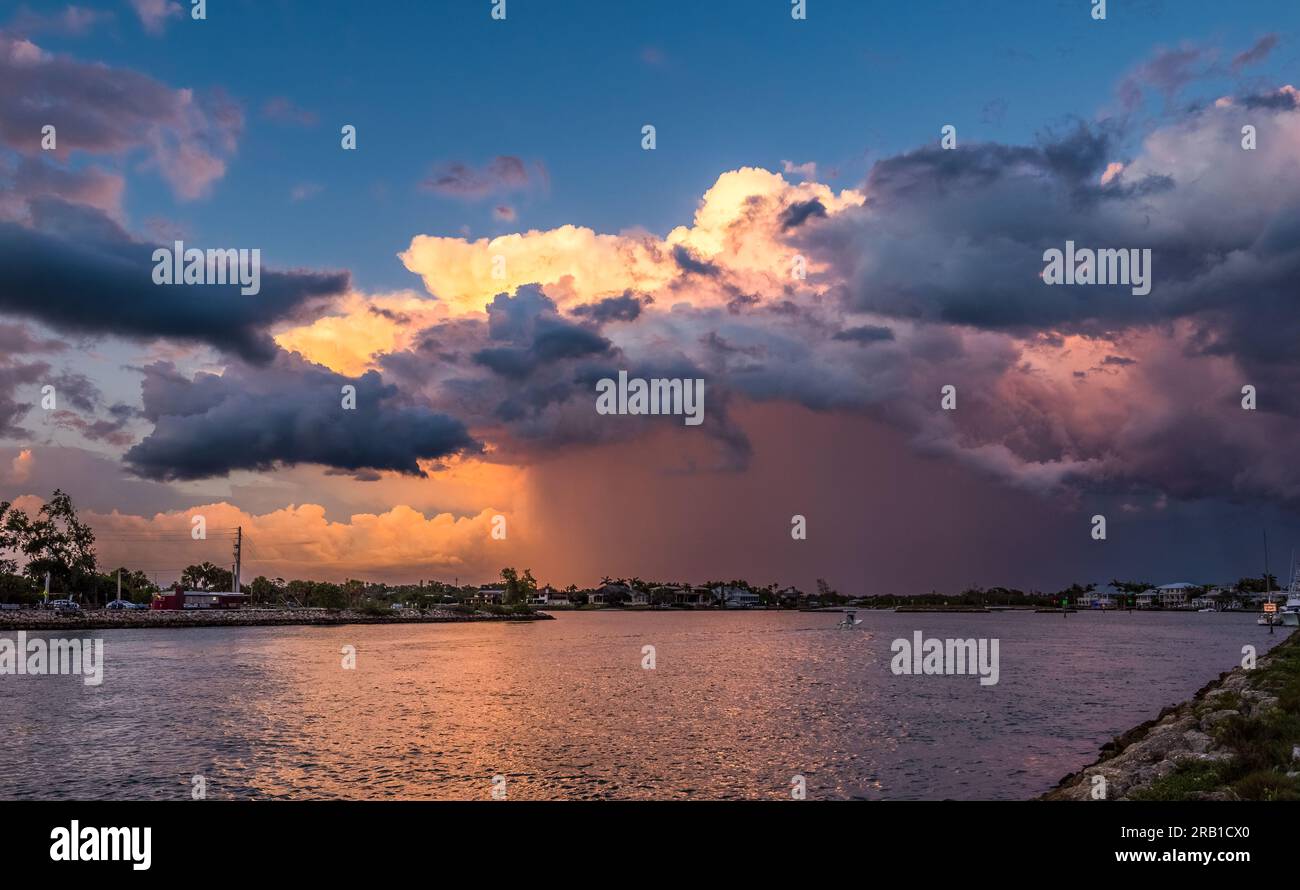 Rain Storm over the Gulf Intracoastal Waterway and the city of Venice Florida USA Stock Photo