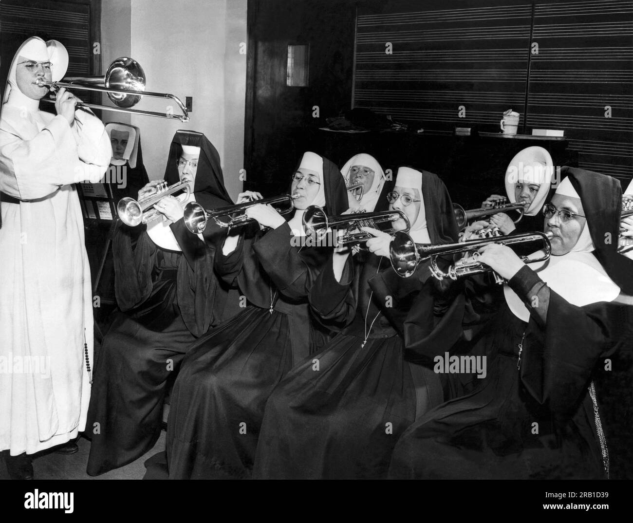 Chicago, Illinois:  July 6, 1945. Nuns from various Catholic orders rehearse at the De Paul University School of Music for a concert. The band members are music teachers at parochial schools throughout the nation. Stock Photo