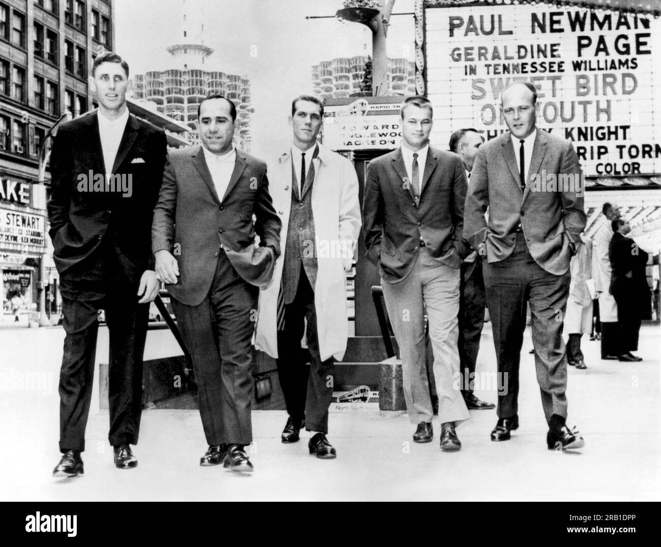 Chicago, Illinois:  May 2, 1962 New York Yankee players looking for relaxation during their series against the White Sox walk down State Street en route to a movie. L-R: Jim Coates, Yogi Berra, Phil Linz, Jim Boulton and Bud Daley. Stock Photo