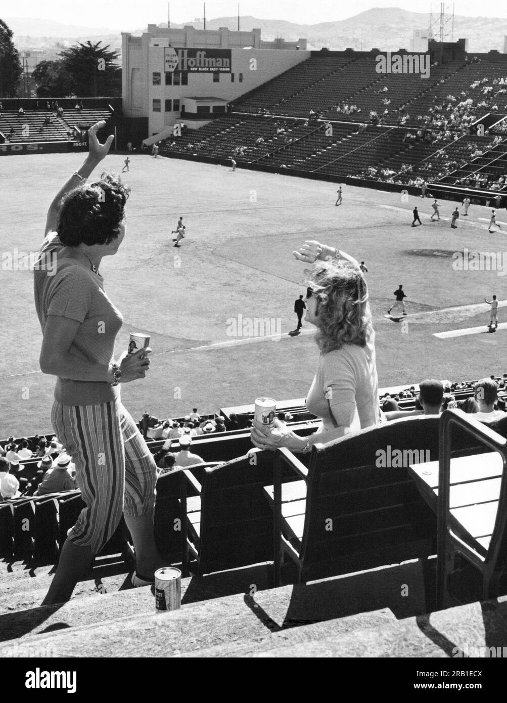 Red and black fans cheering Black and White Stock Photos & Images - Alamy
